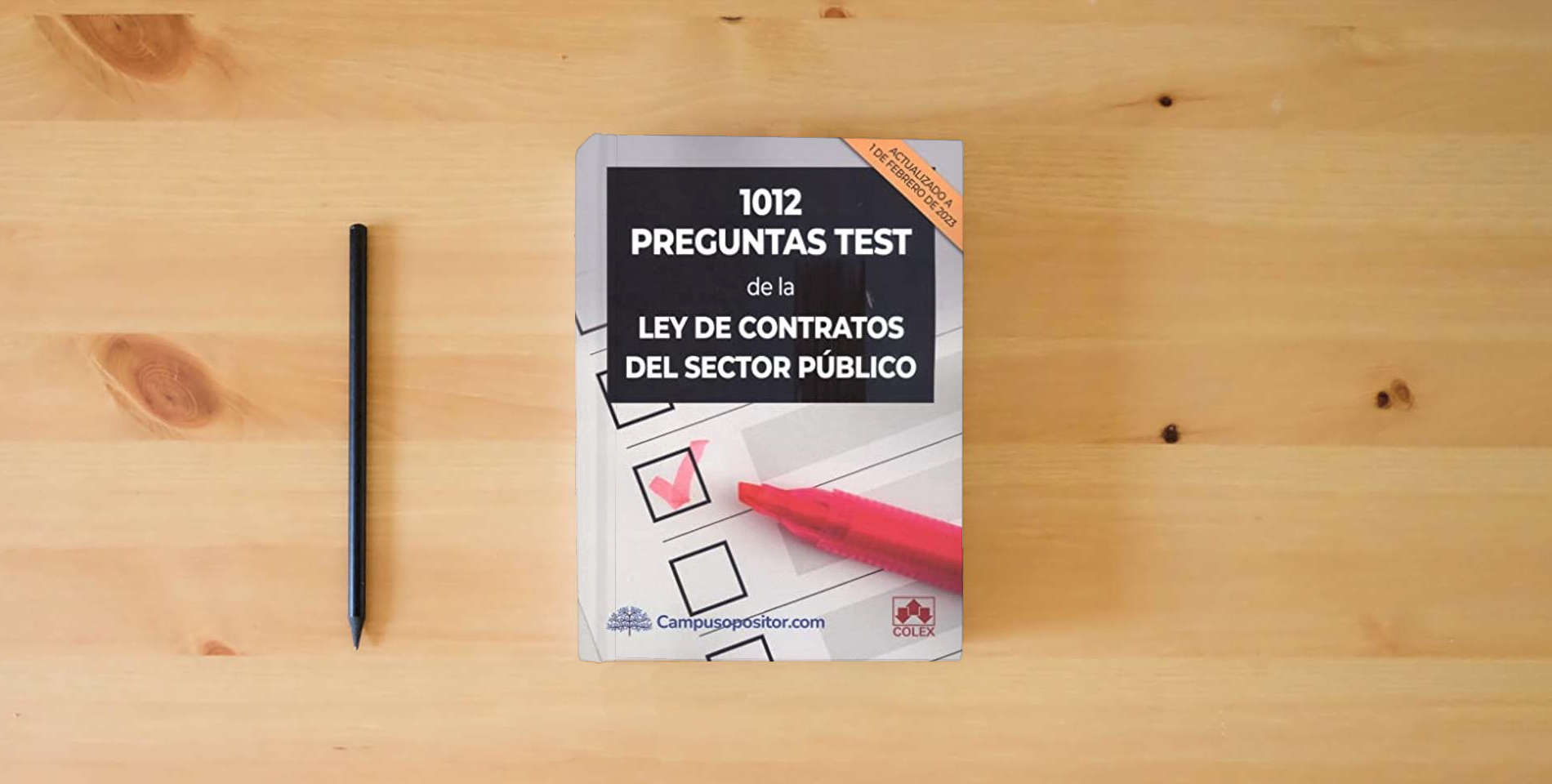 The book 1012 preguntas test de la Ley de Contratos del Sector Público (CAMPUS OPOSITOR) is on the table