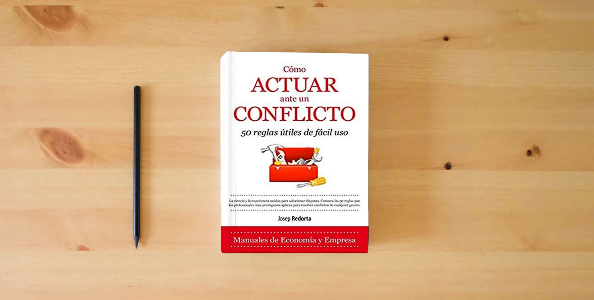 The book Cómo Actuar Ante Un Conflicto (ECONOMIA Y EMPRESA) is on the table