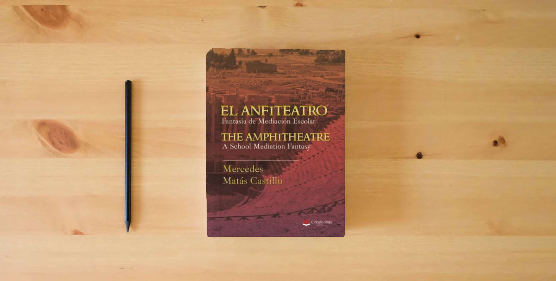 The book EL ANFITEATRO. Fantasía de mediación escolar. THE AMPHITHEATRE. A school mediation fantasy (SIN COLECCION) is on the table
