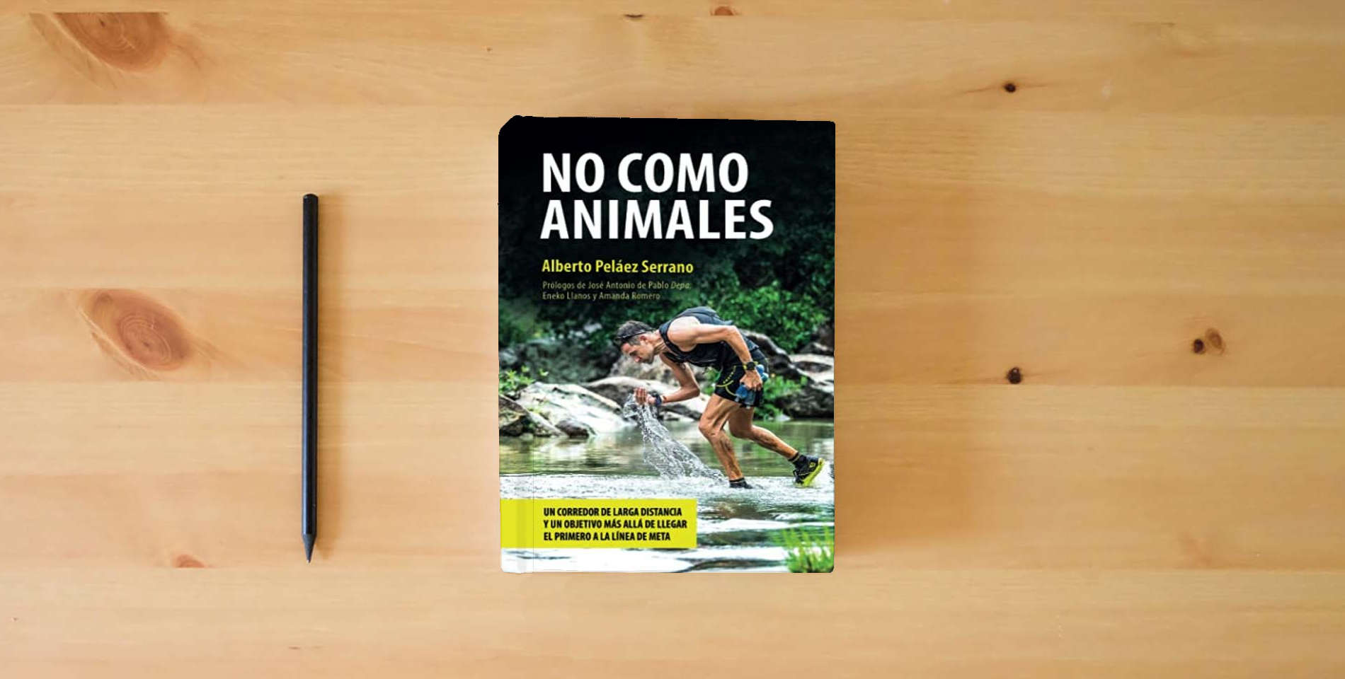 The book No como Animales: 5 (Conciencia) is on the table