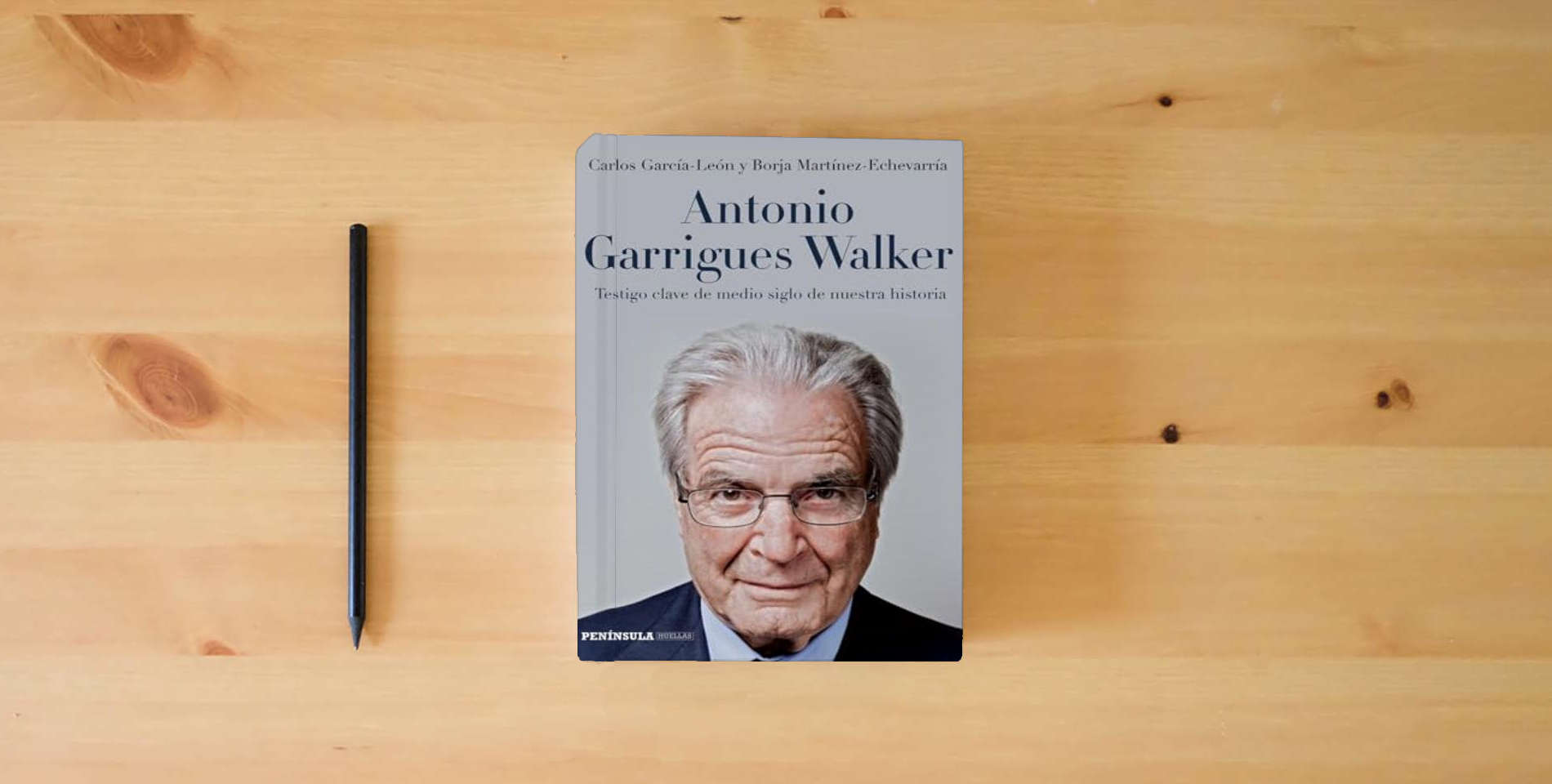 The book Antonio Garrigues Walker: Testigo clave de medio siglo de nuestra historia (PENINSULA) is on the table