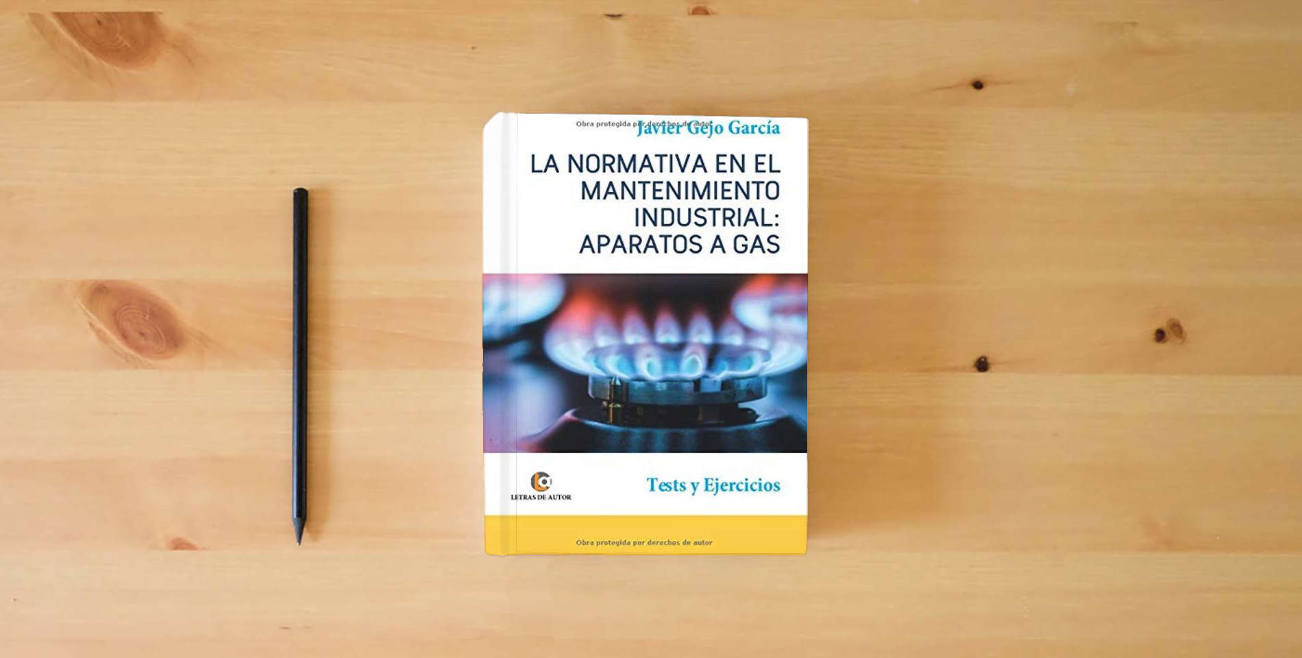 The book APARATOS A GAS. LA NORMATIVA EN EL MANTENIMIENTO INDUSTRIAL.: Tests y Ejercicios. is on the table