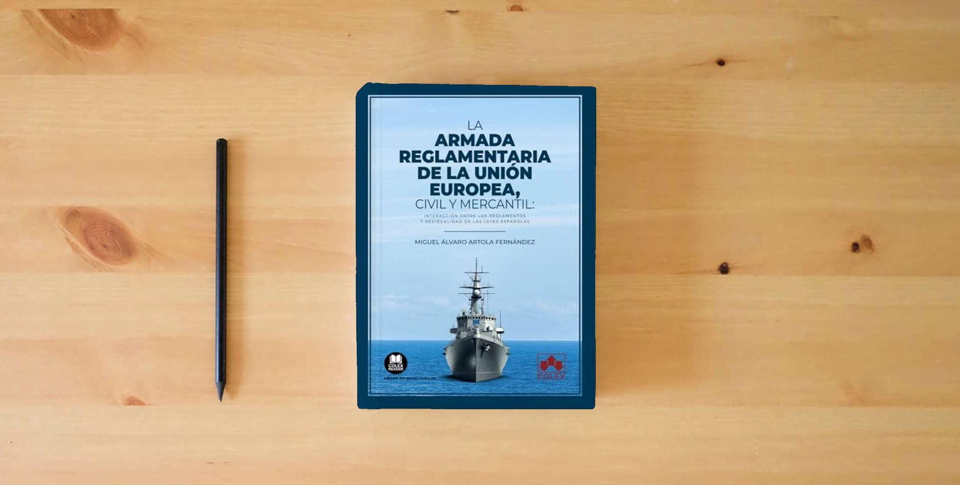 The book La armada reglamentaria de la Unión Europea, civil y mercantil: Interacción entre los Reglamentos y residualidad de las leyes españolas (Monografía) is on the table