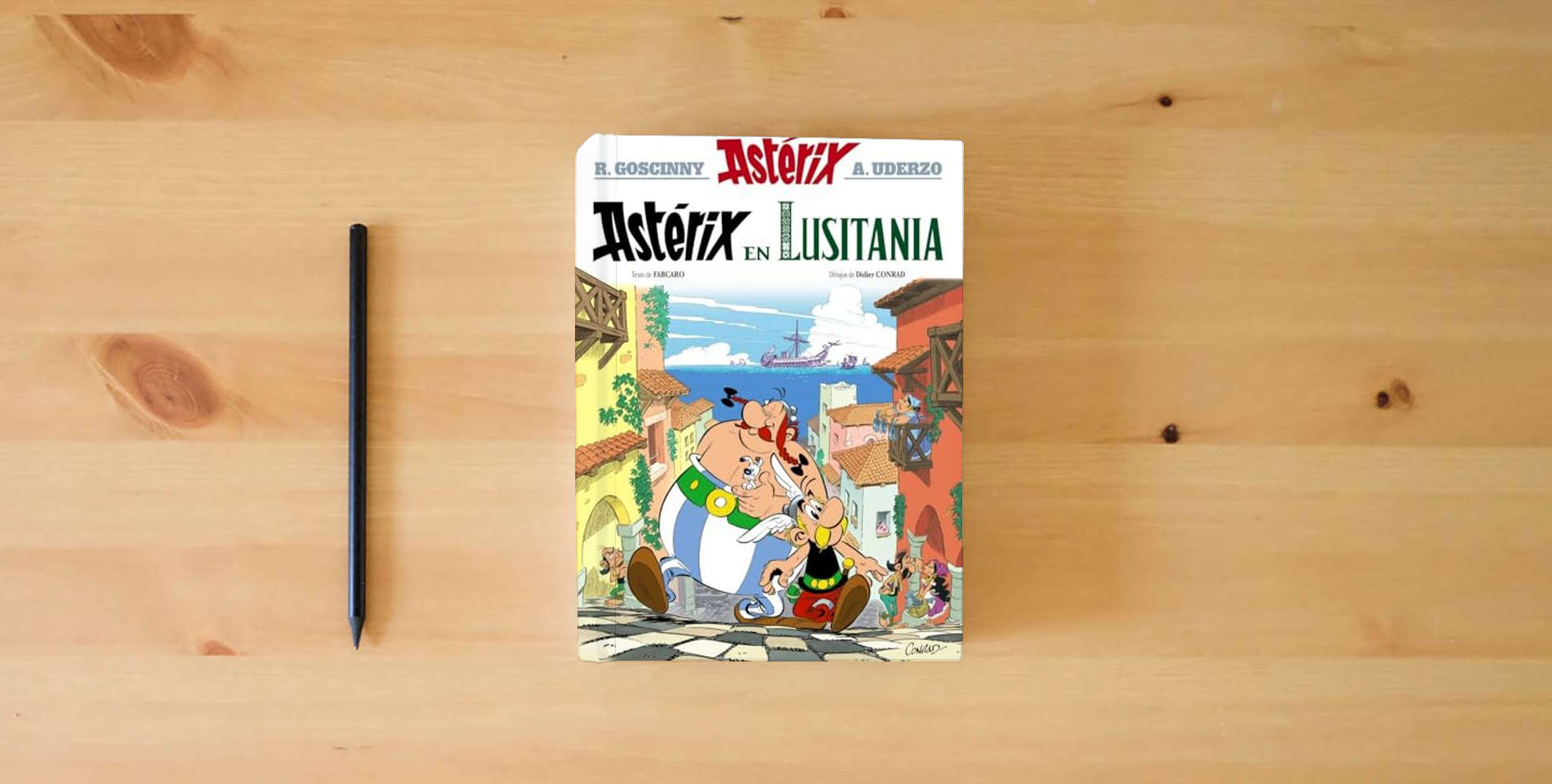 The book Astérix en Lusitania is on the table