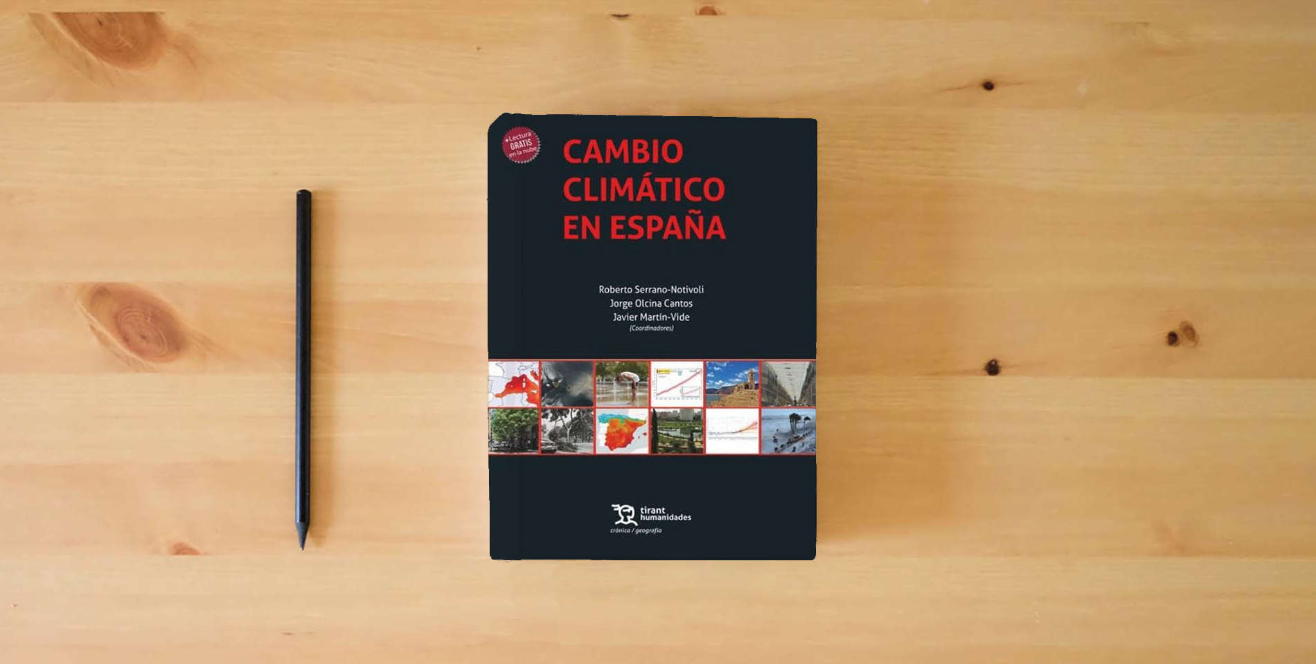 The book Cambio climático en España (Crónica/ Geografía) is on the table
