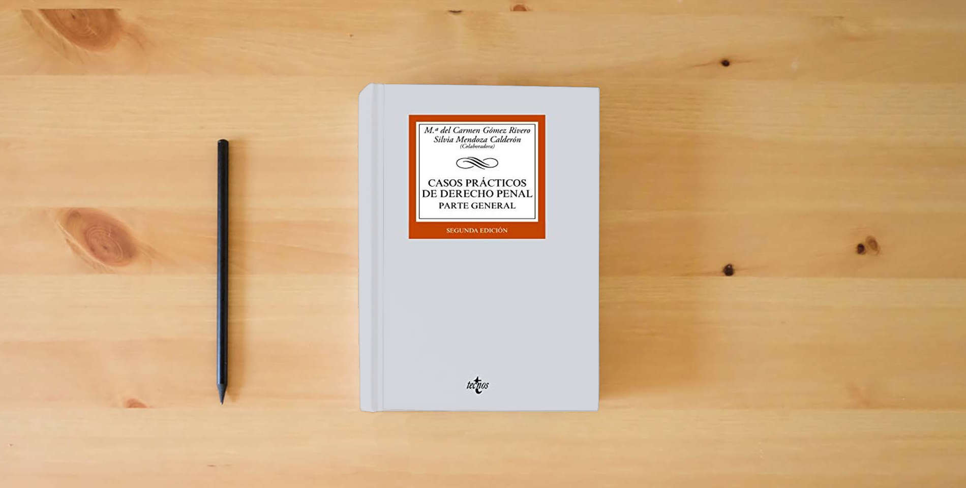 The book Casos prácticos de Derecho penal: Parte General (Derecho - Biblioteca Universitaria de Editorial Tecnos) is on the table
