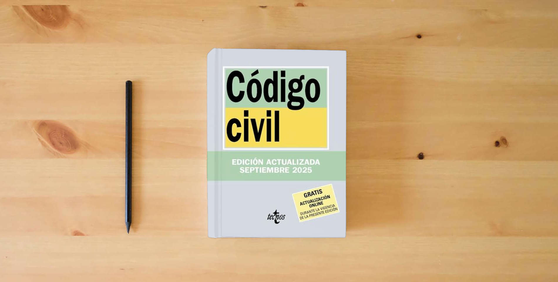 The book Código Civil (Derecho - Biblioteca de Textos Legales) is on the table