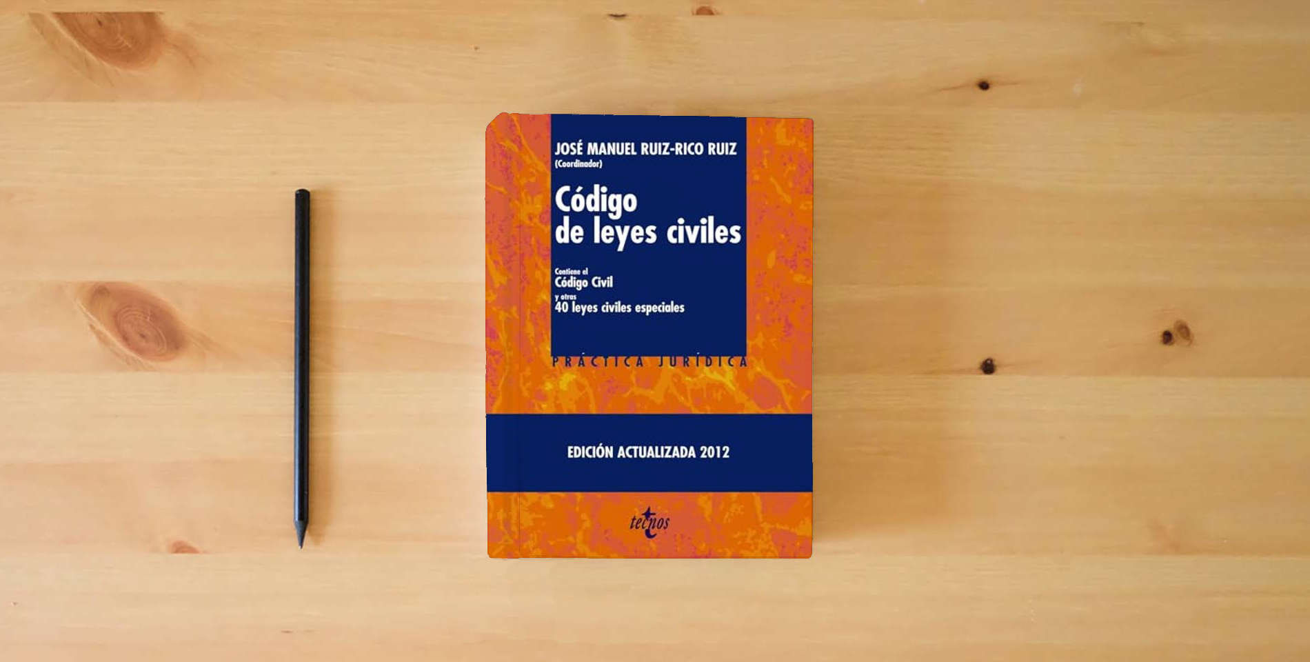 The book Código de leyes civiles: Contiene el Código Civil y otras 40 leyes civiles especiales (Derecho - Práctica Jurídica) is on the table