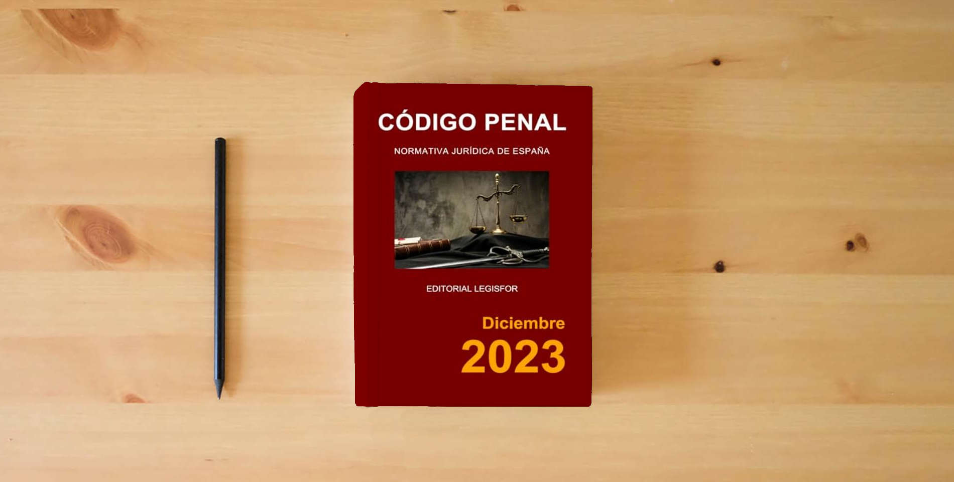 The book Código Penal. Normativa jurídica de España is on the table