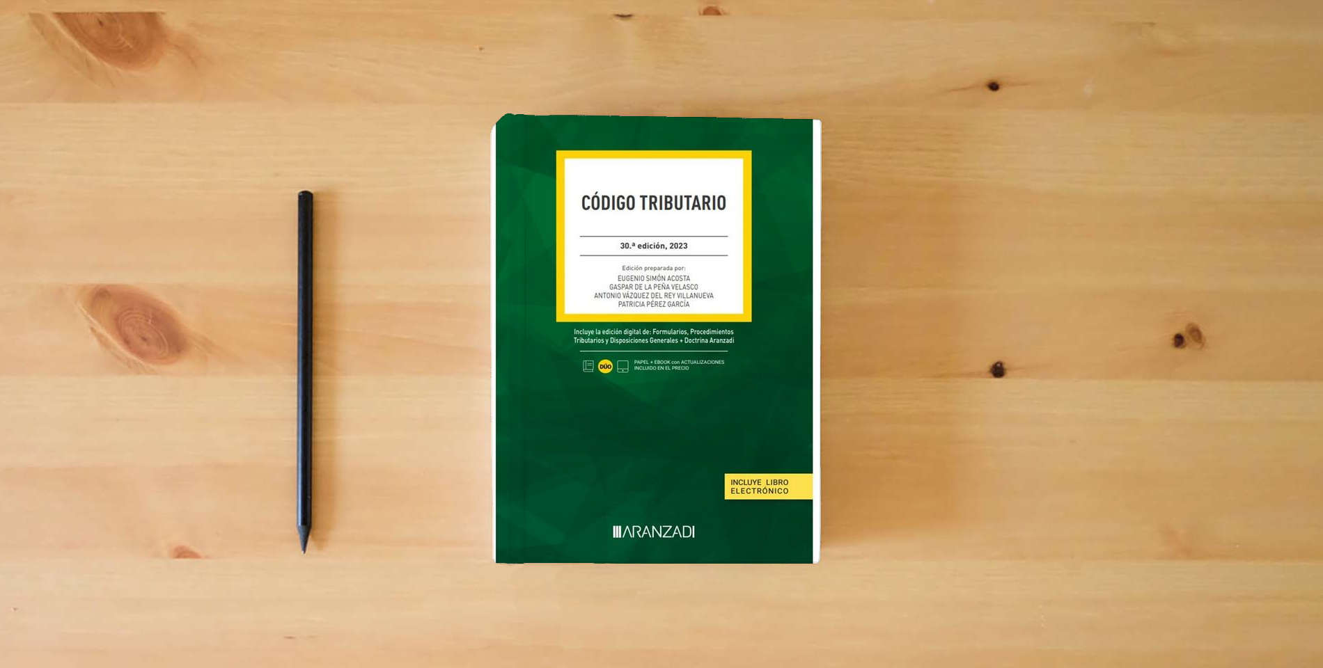 The book Código Tributario: 9 (Código Básico) is on the table
