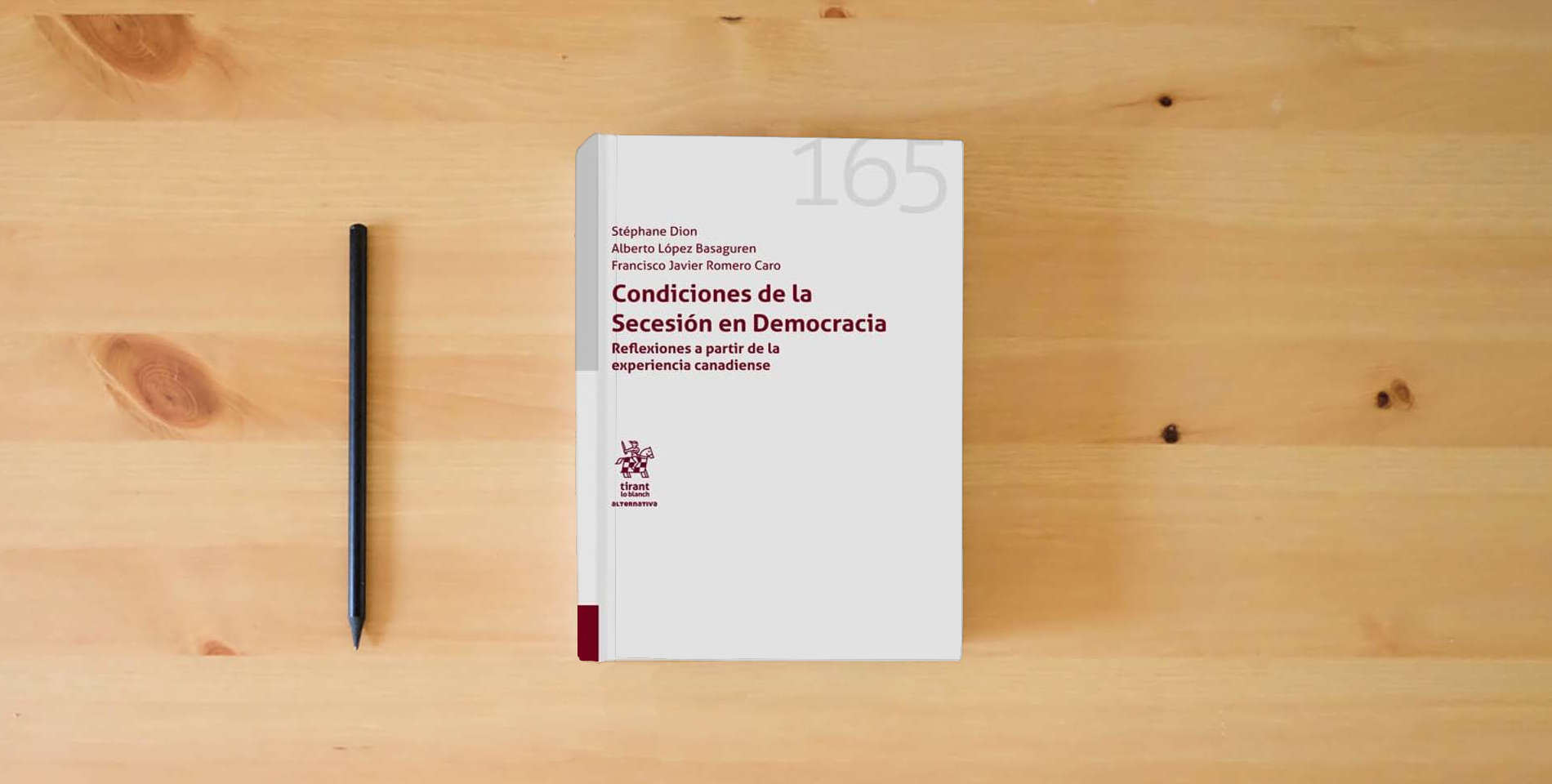 The book Condiciones de la Secesión en Democracia. Reflexiones a partir de la experiencia canadiense (Alternativa) is on the table