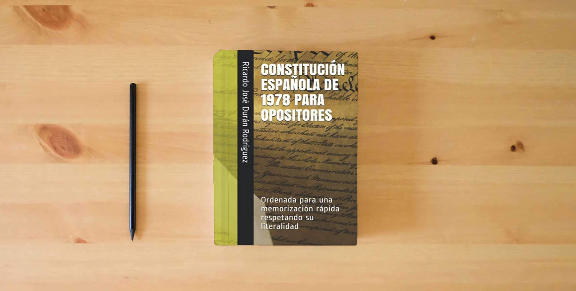 The book CONSTITUCIÓN ESPAÑOLA DE 1978 PARA OPOSITORES: Ordenada para una memorización rápida respetando su literalidad is on the table