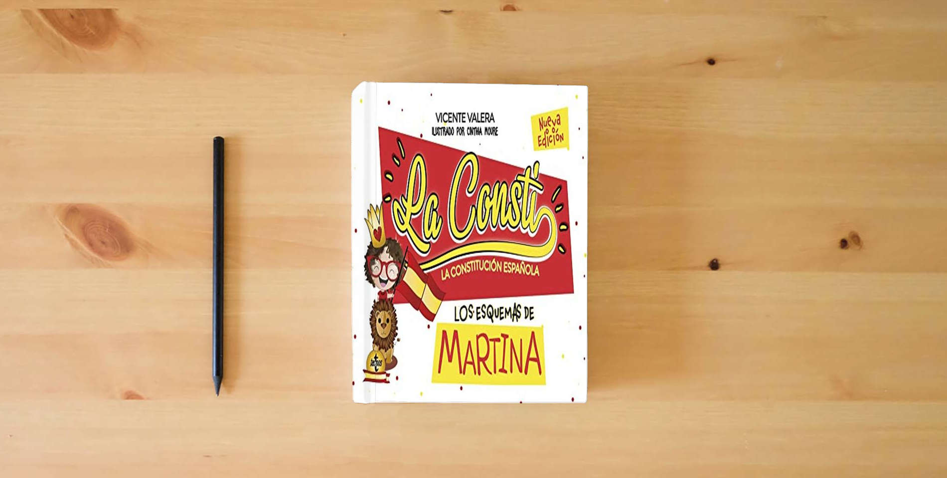 The book Constitución Española. Los esquemas de Martina (Derecho - Práctica Jurídica) is on the table