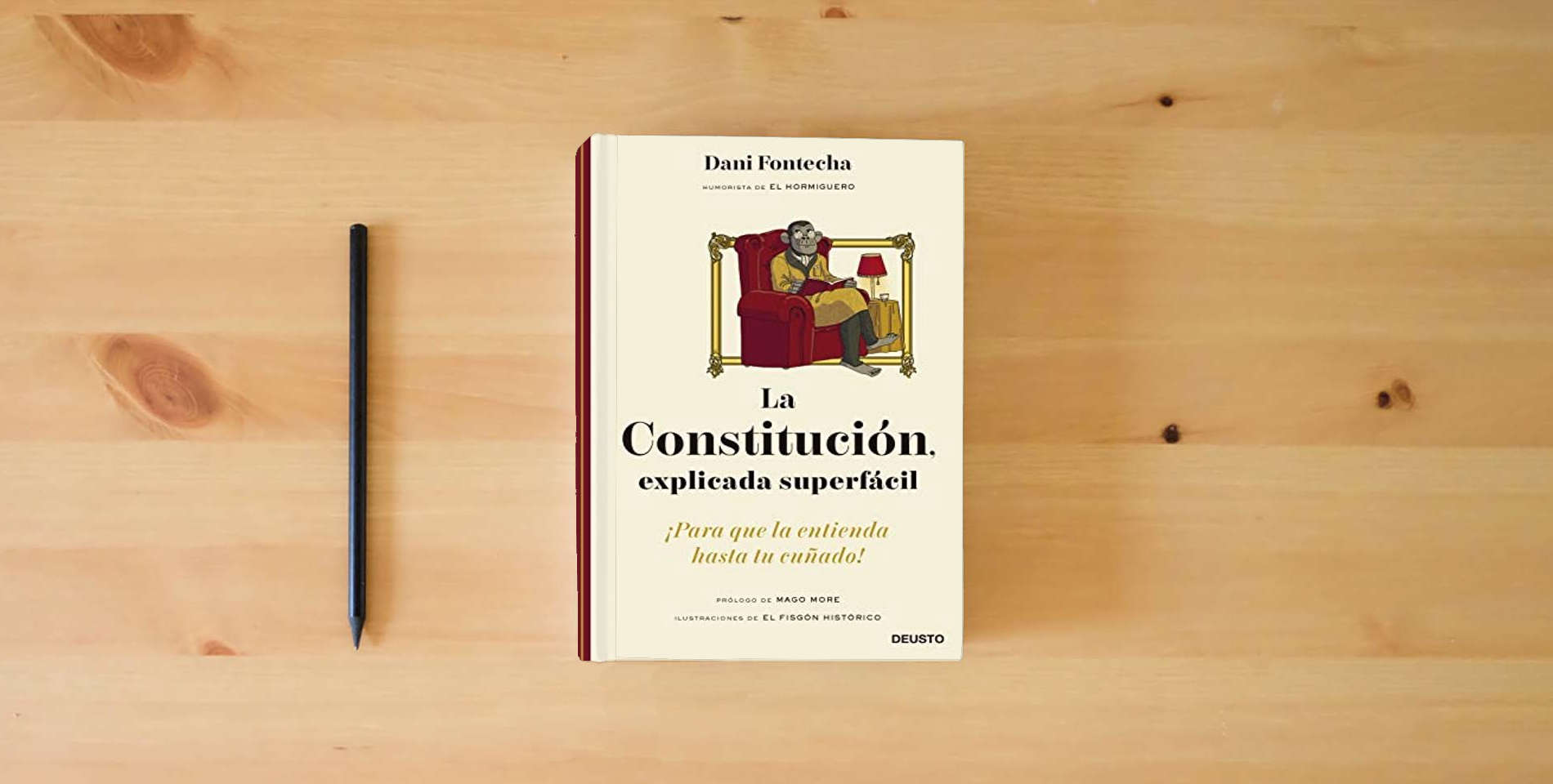 The book La Constitución, explicada superfácil: ¡Para que la entienda hasta tu cuñado! (Deusto) is on the table