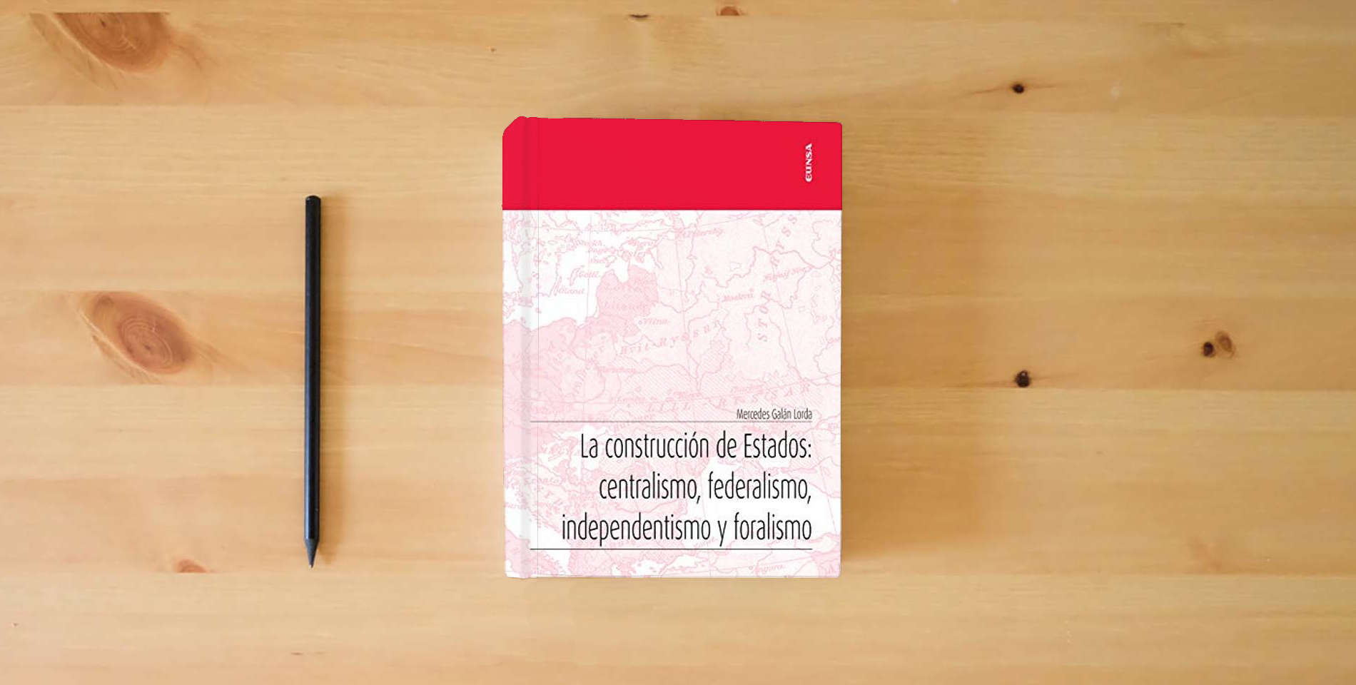 The book La Construcción De Estados: Centralismo, Federalismo, independentismo y Foralismo (Apuntes) is on the table