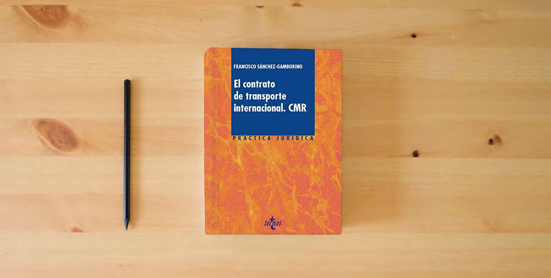 The book El contrato de transporte internacional. CMR (Derecho - Práctica Jurídica) is on the table