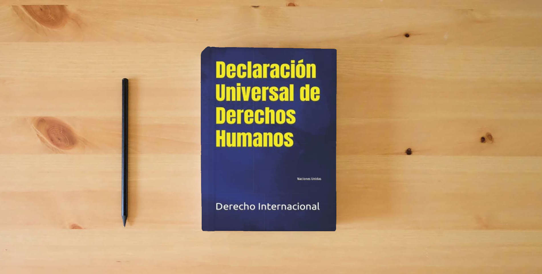 The book Declaración Universal de Derechos Humanos: Naciones Unidas is on the table