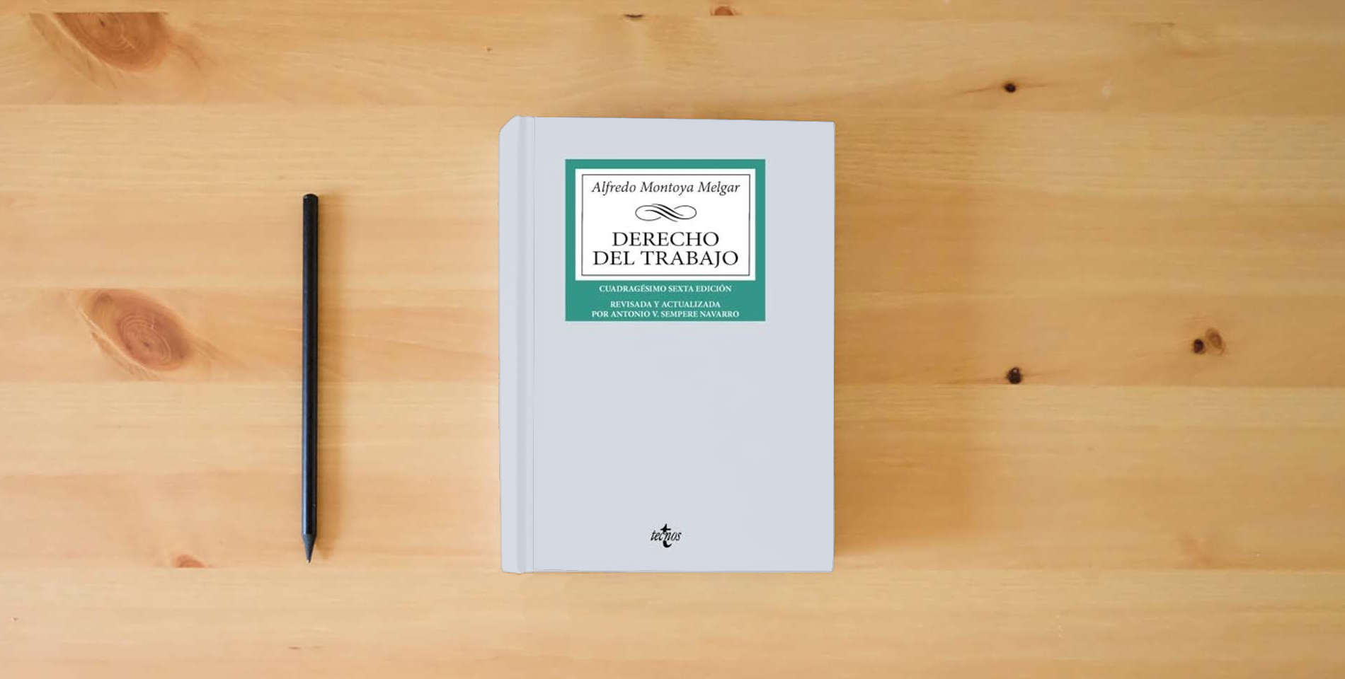 The book Derecho del Trabajo (Derecho - Biblioteca Universitaria de Editorial Tecnos) is on the table