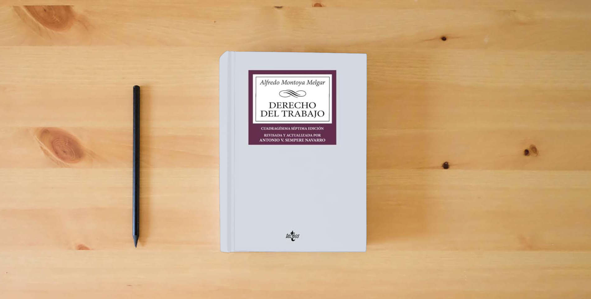 The book Derecho del Trabajo (Derecho - Biblioteca Universitaria de Editorial Tecnos) is on the table