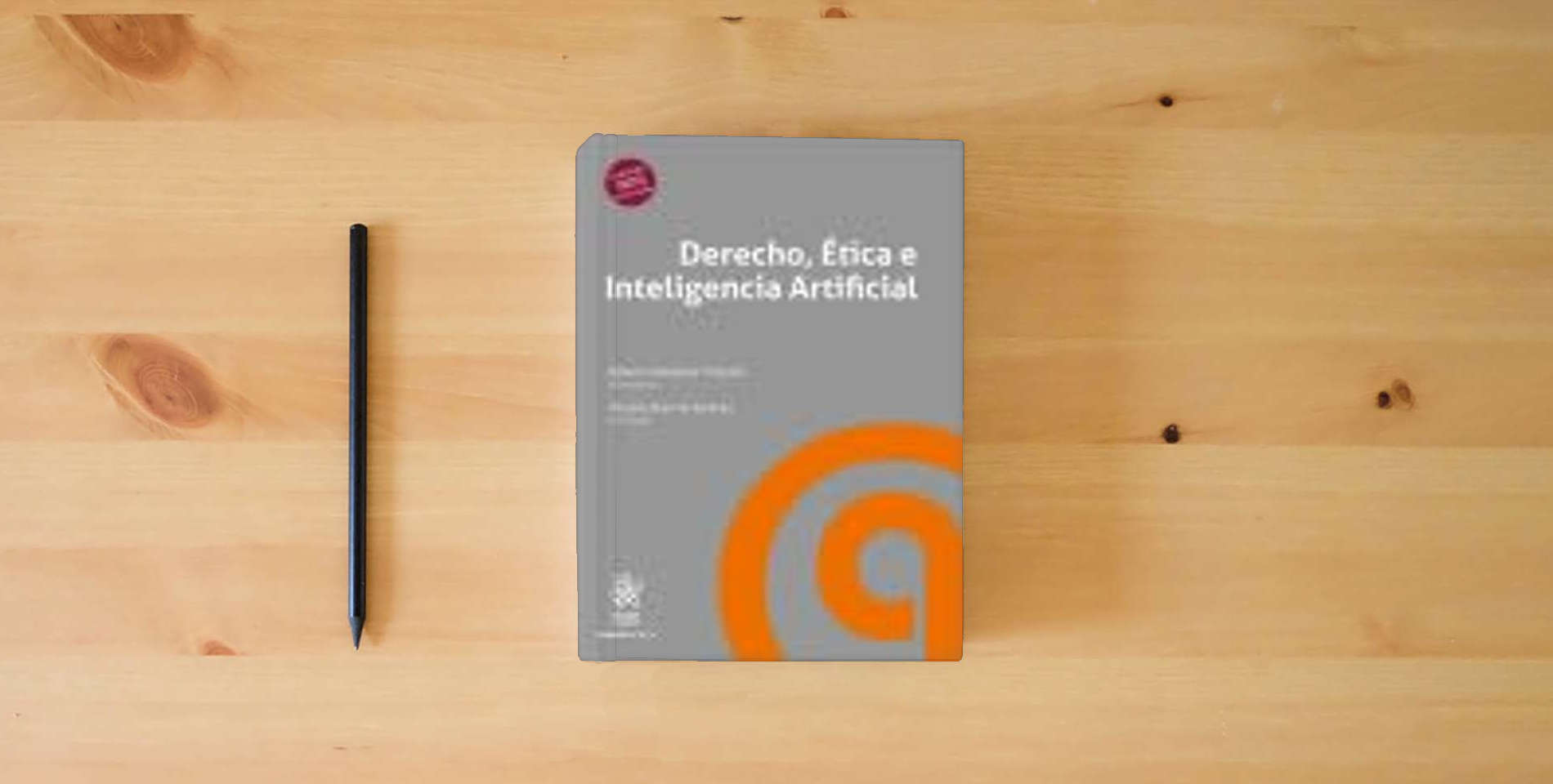 The book Derecho, Ética e Inteligencia Artificial (Derecho y Tic´s) is on the table