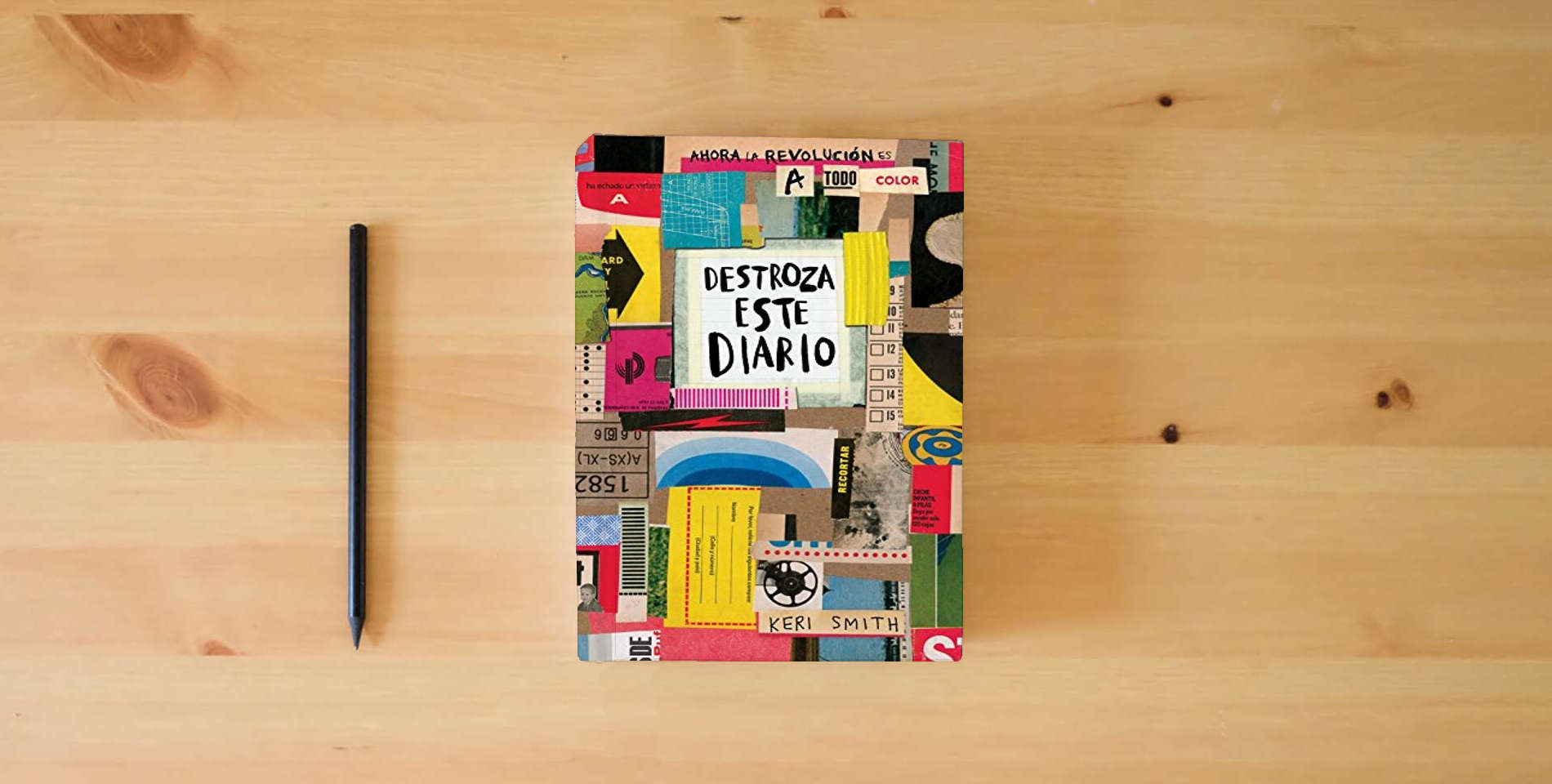 The book Destroza este diario. Ahora a todo color (Libros Singulares) is on the table