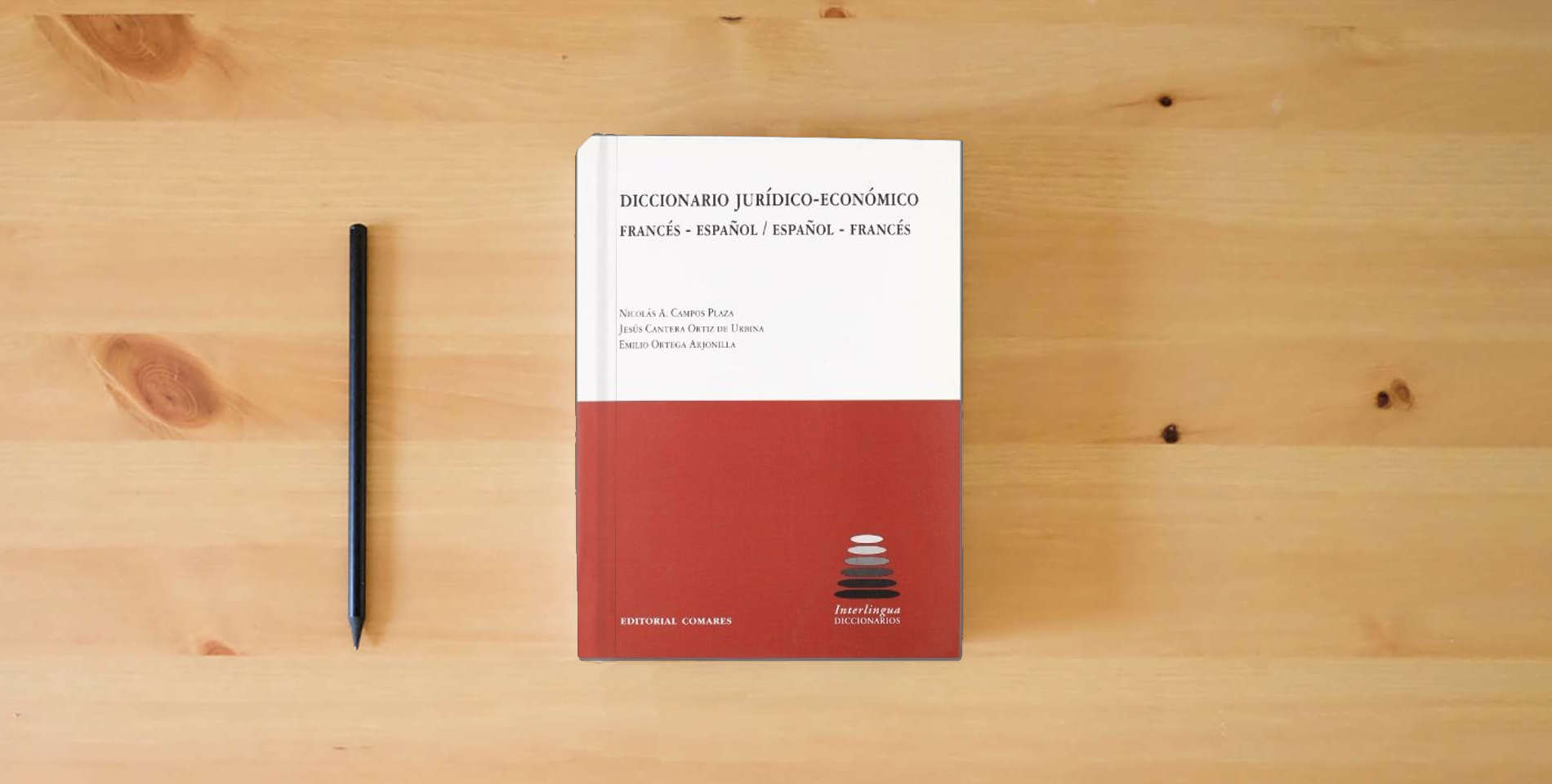 The book Diccionario jurídico-económico francés-español / español-francés (SIN COLECCION) is on the table