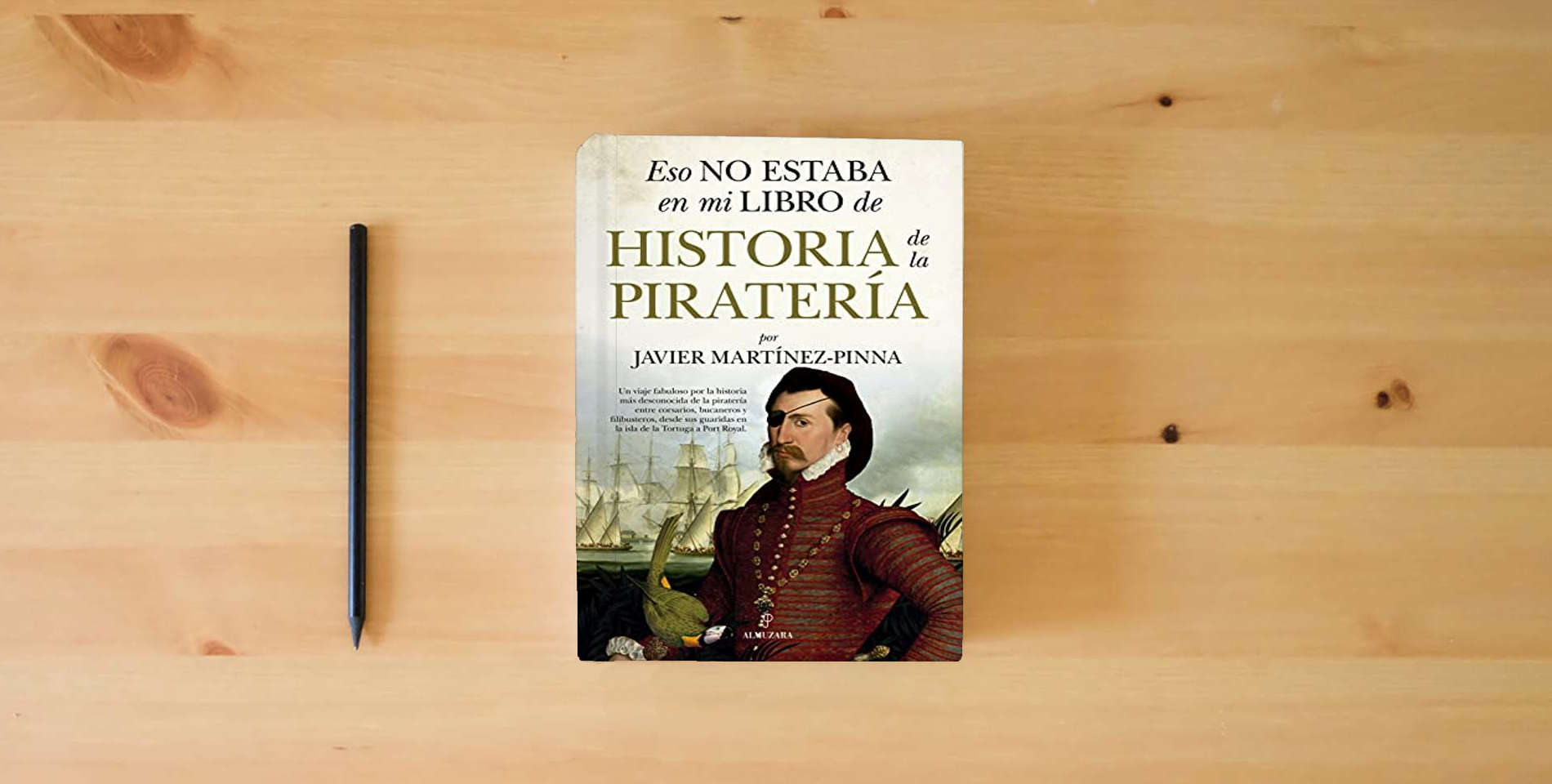 The book Eso no estaba en mi libro de historia de la piratería is on the table