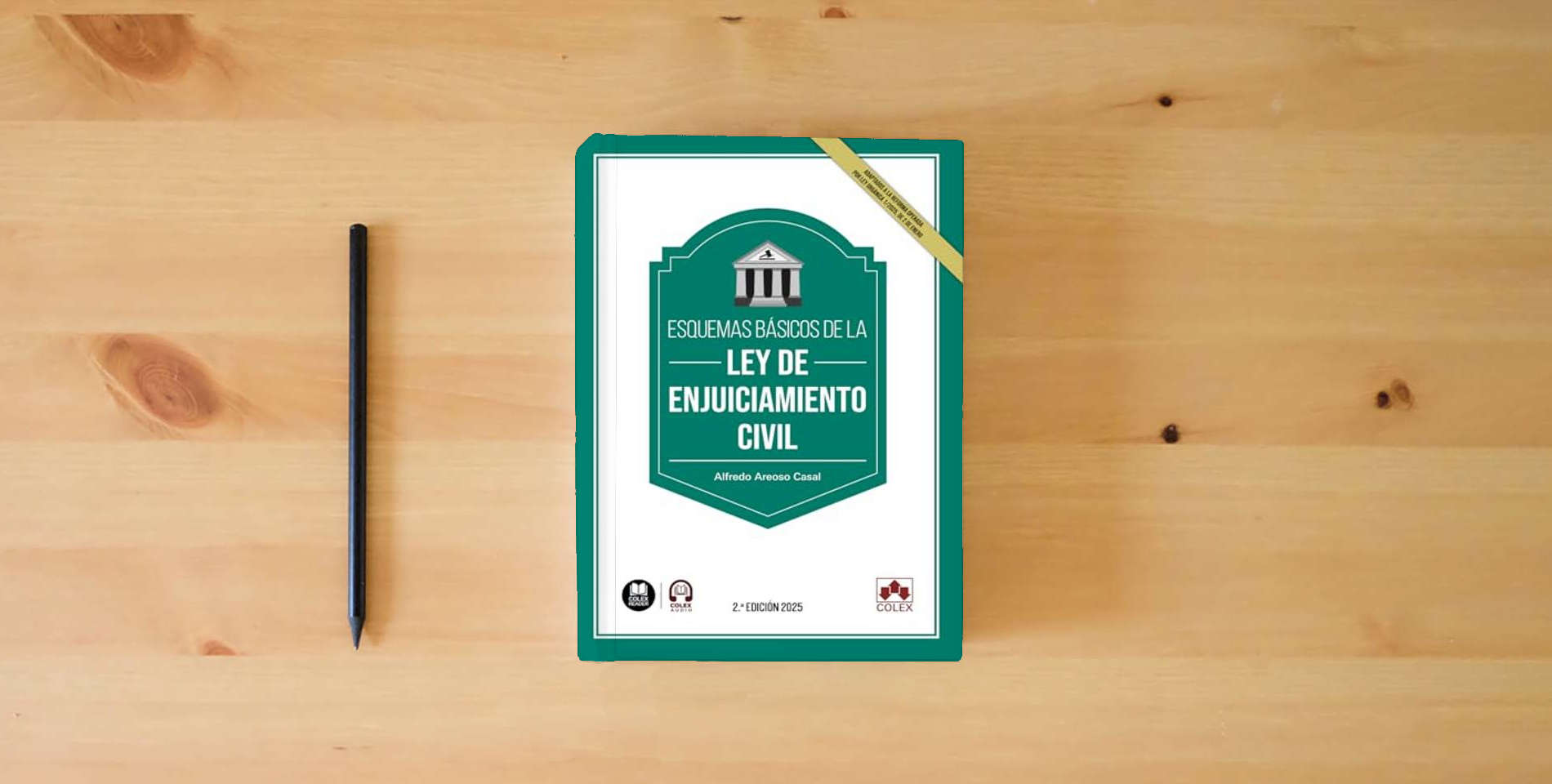 The book Esquemas básicos de la Ley de Enjuiciamiento civil: (Adaptados a la Ley Orgánica 1/2025, de 2 de enero, de medidas en materia de eficiencia del Servicio Público de Justicia) (monografico) is on the table