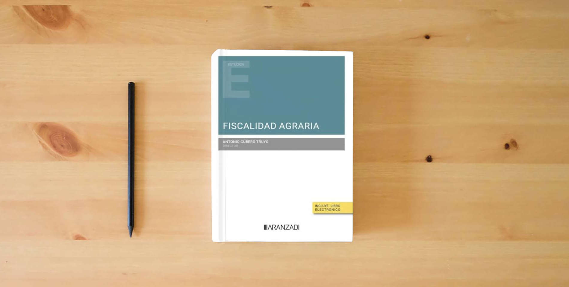 The book Fiscalidad agraria (Estudios) is on the table