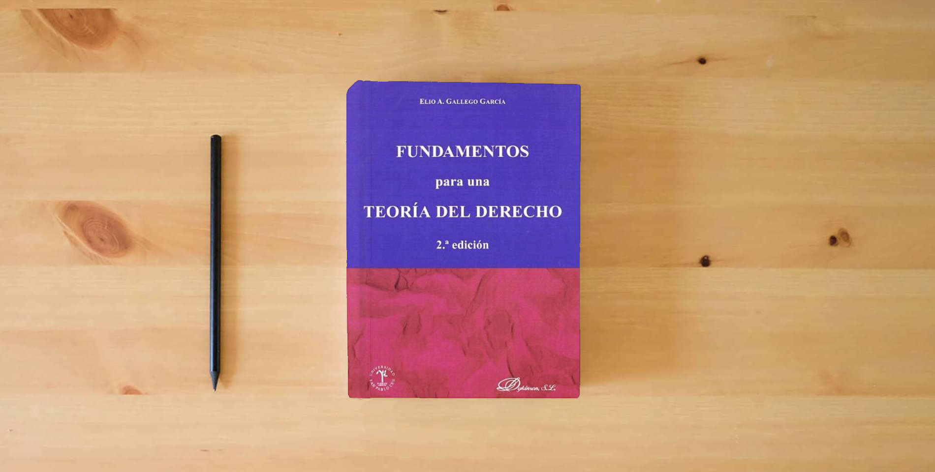 The book Fundamentos Para Una Teoría Del Derecho 2ª Edición (SIN COLECCION) is on the table