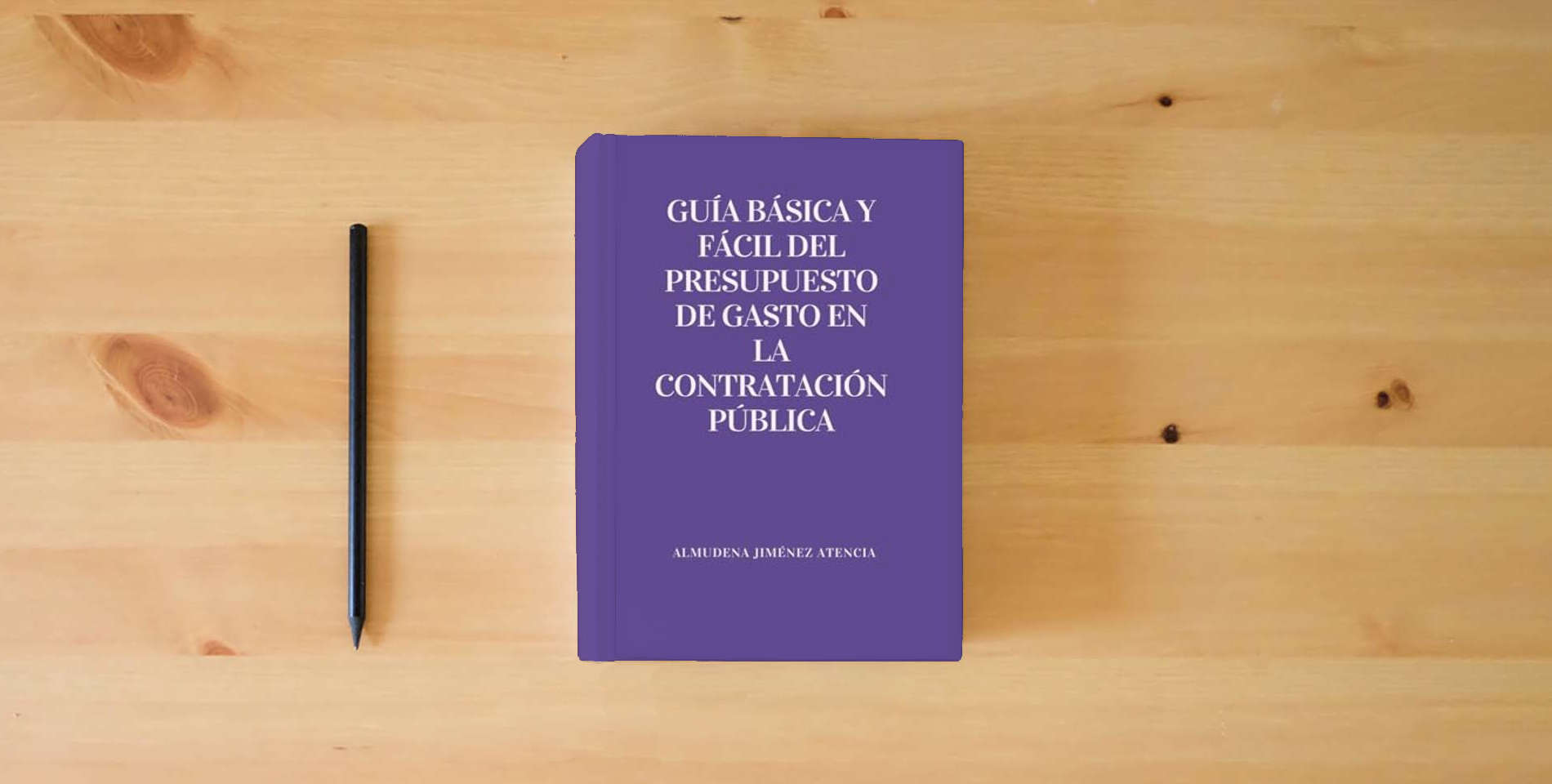 The book Guía básica y fácil del presupuesto de gasto en la contratación pública is on the table