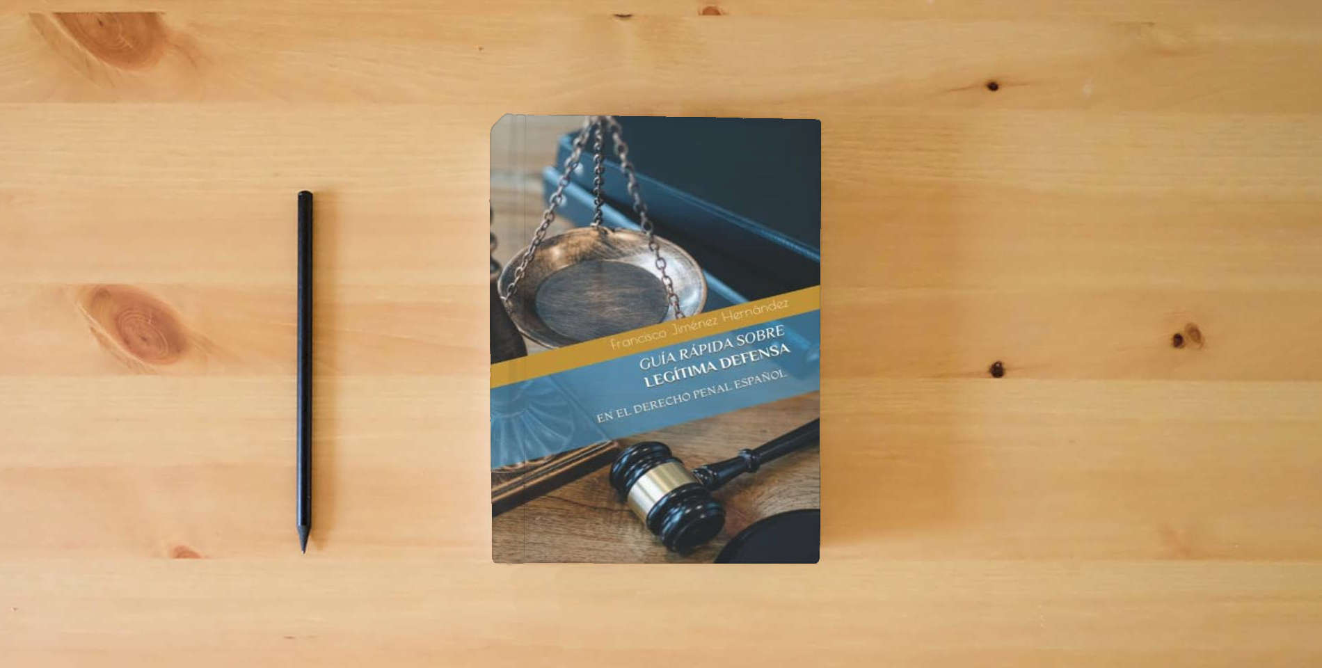 The book GUÍA RÁPIDA SOBRE LEGÍTIMA DEFENSA: EN EL DERECHO PENAL ESPAÑOL is on the table