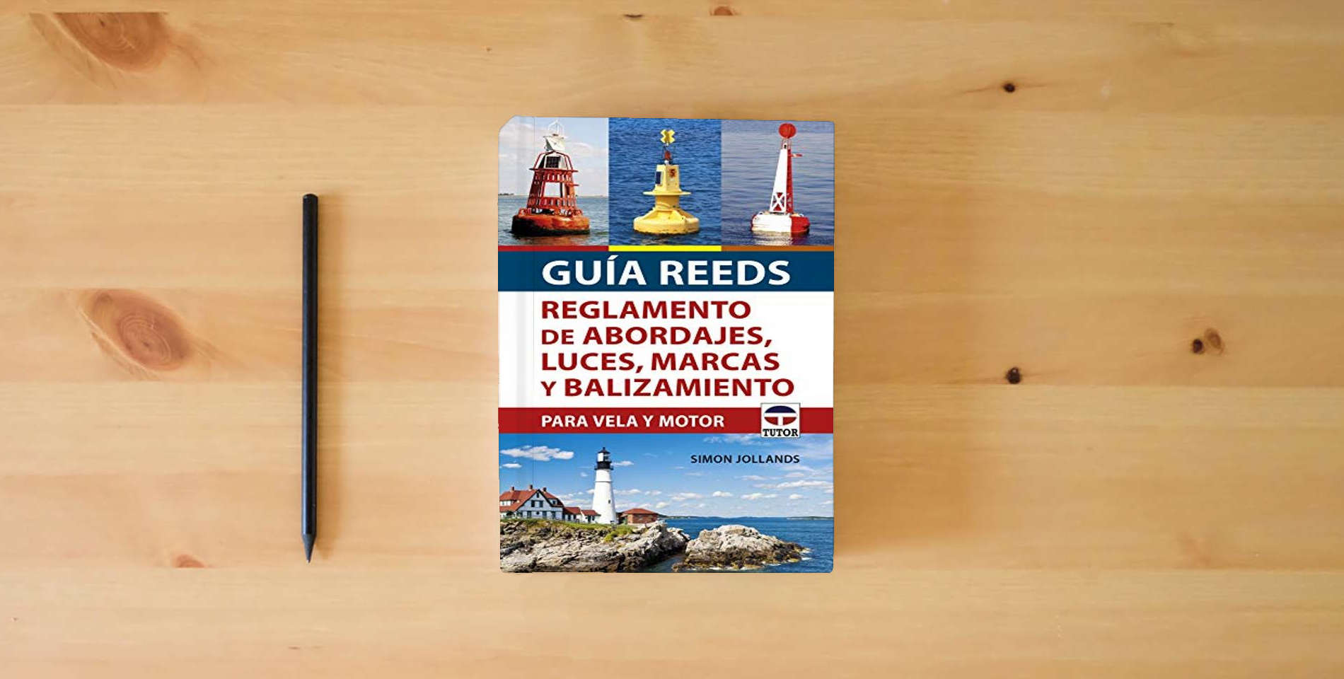 The book Guía REEDS reglamento de abordajes, luces, marcas y balizamiento: Para vela y motor (SIN COLECCION) is on the table