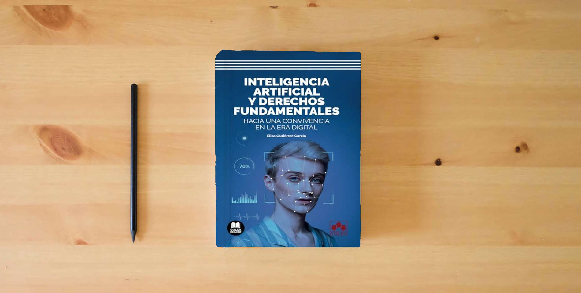 The book Inteligencia artificial y derechos fundamentales: Hacia una convivencia en la era digital (Bolsillo) is on the table
