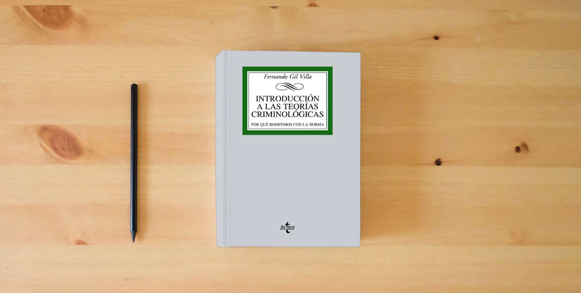The book Introducción a las teorías criminológicas: Por qué rompemos con la norma (Derecho - Biblioteca Universitaria de Editorial Tecnos) is on the table