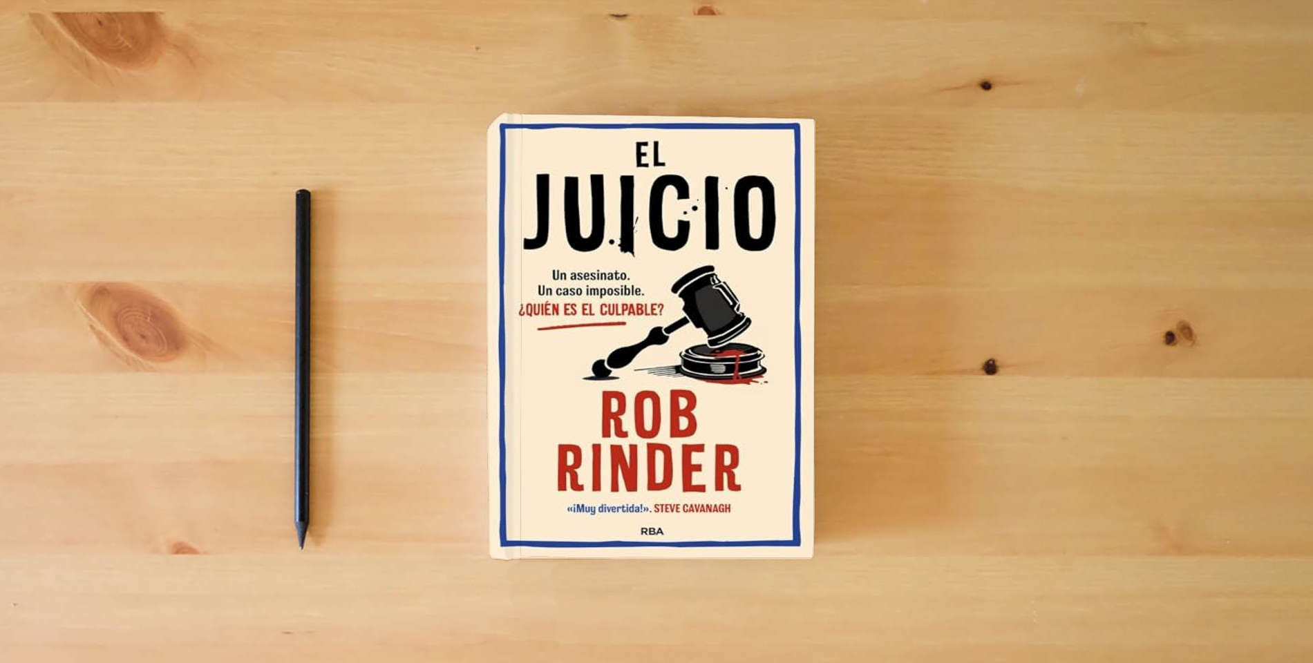 The book El juicio (Serie Negra) is on the table