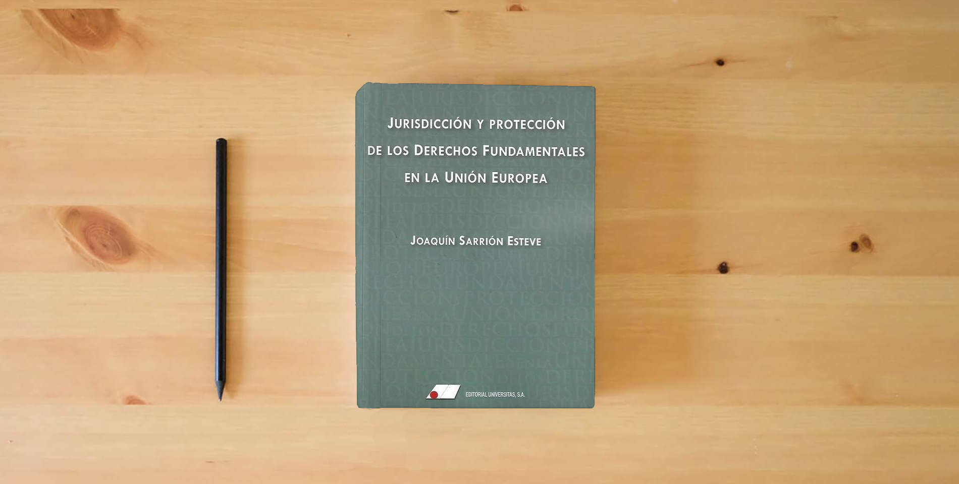 The book Jurisdicción y protección de los derechos fundamentales en la Unión Europea (FONDO) is on the table