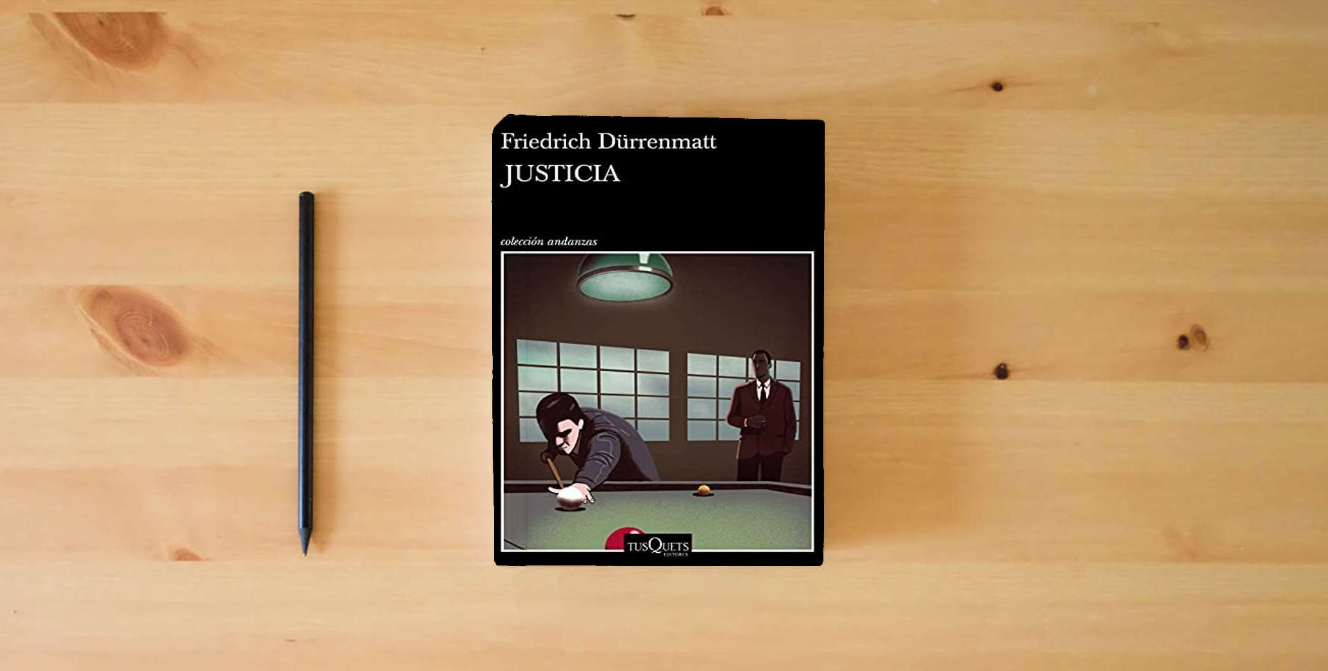 The book Justicia (Andanzas) is on the table