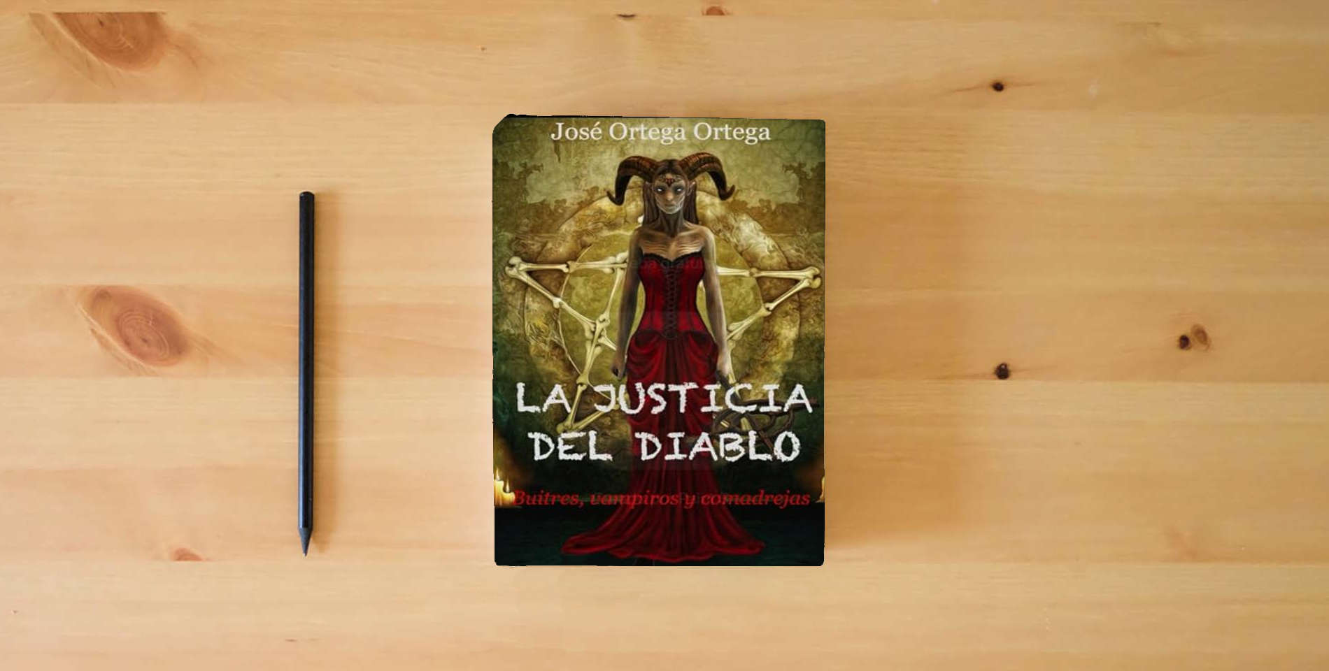 The book LA JUSTICIA DEL DIABLO: Vampiros, buitres y comadrejas is on the table