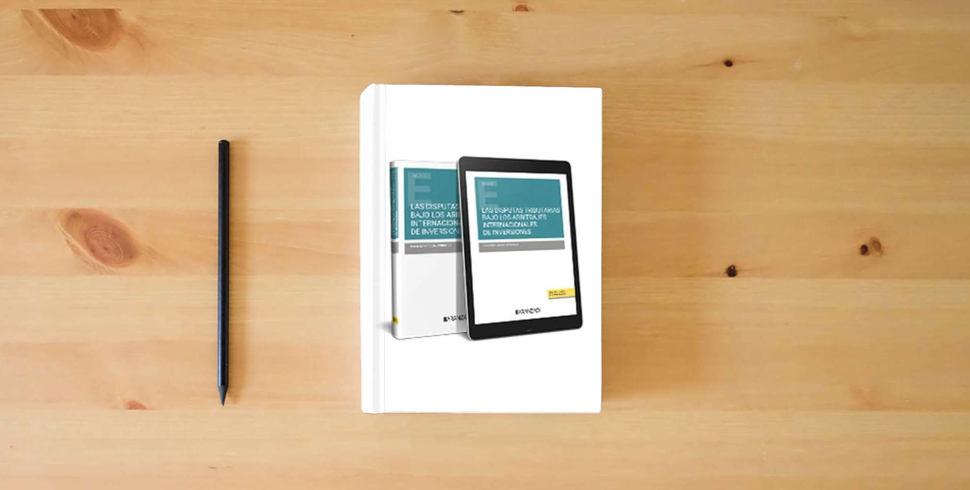 The book LAS DISPUTAS TRIBUTARIAS BAJO LOS ARBITRAJES INTERNACIONALES DE INVERSIONES (Estudios) is on the table
