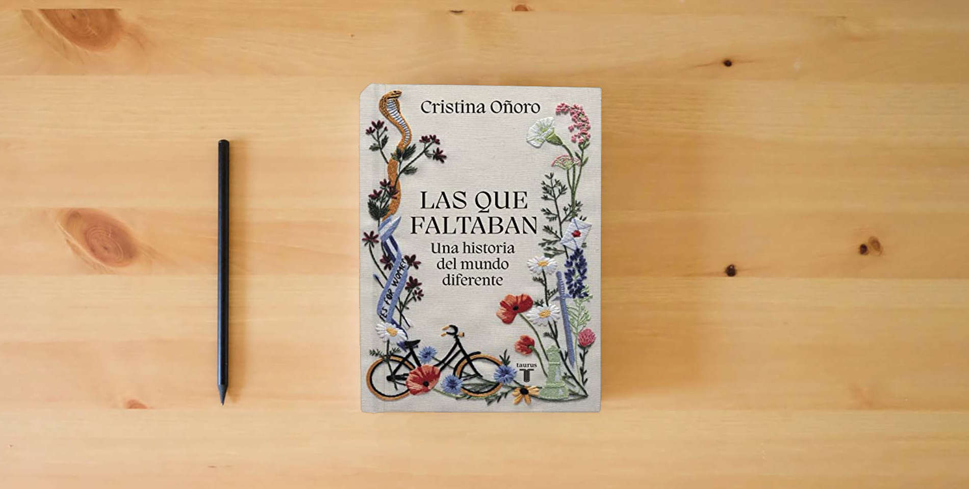 The book Las que faltaban: Una historia del mundo diferente is on the table