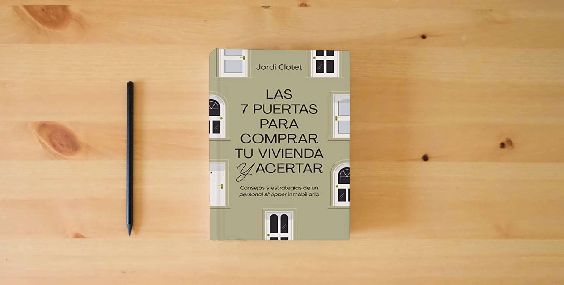 The book Las 7 puertas para comprar tu vivienda y acertar: Consejos y estrategias de un "personal shopper" inmobiliario (Gestión 2000) is on the table