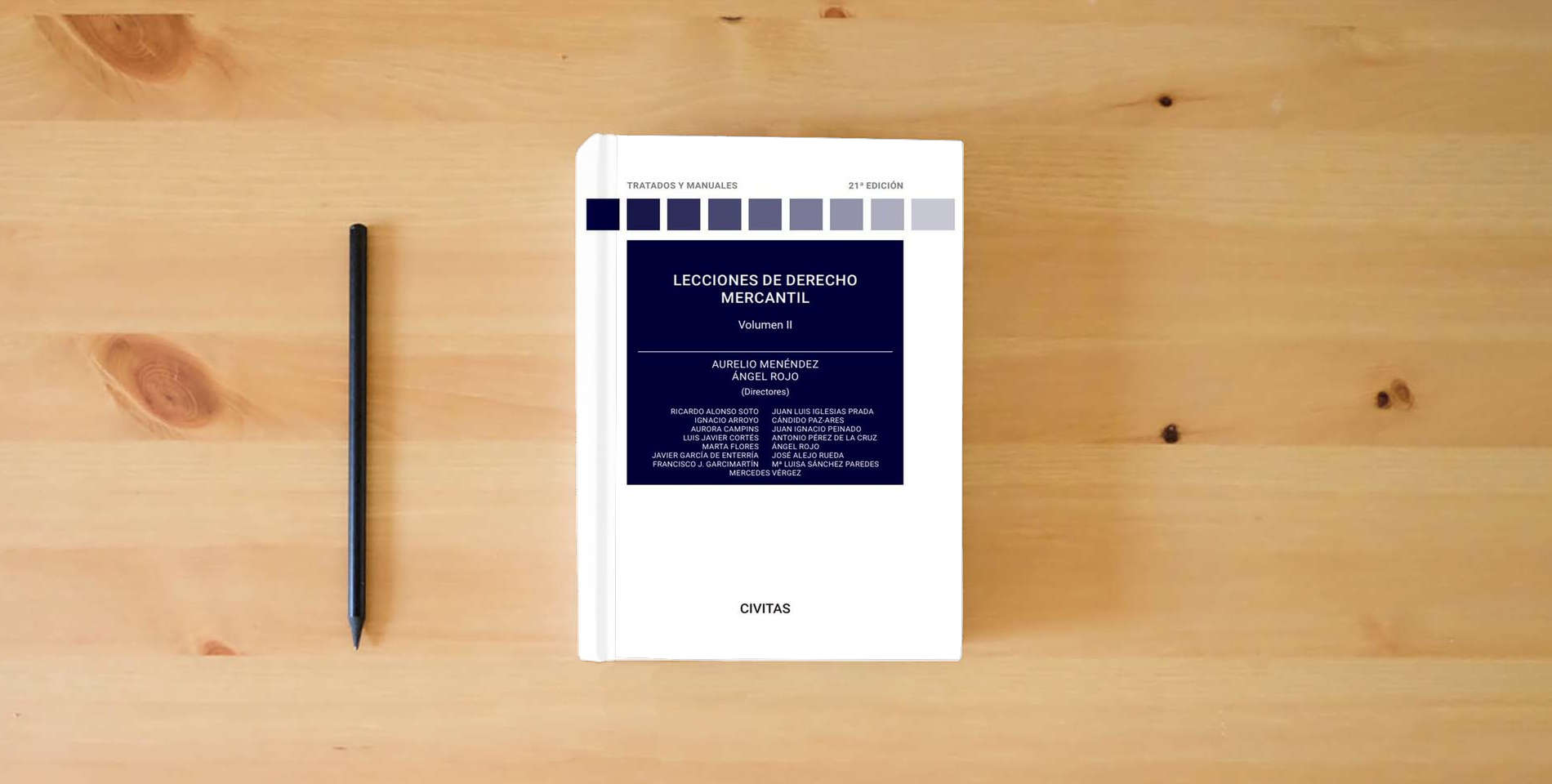 The book Lecciones de Derecho Mercantil Volumen II (Tratados y Manuales de Derecho) is on the table