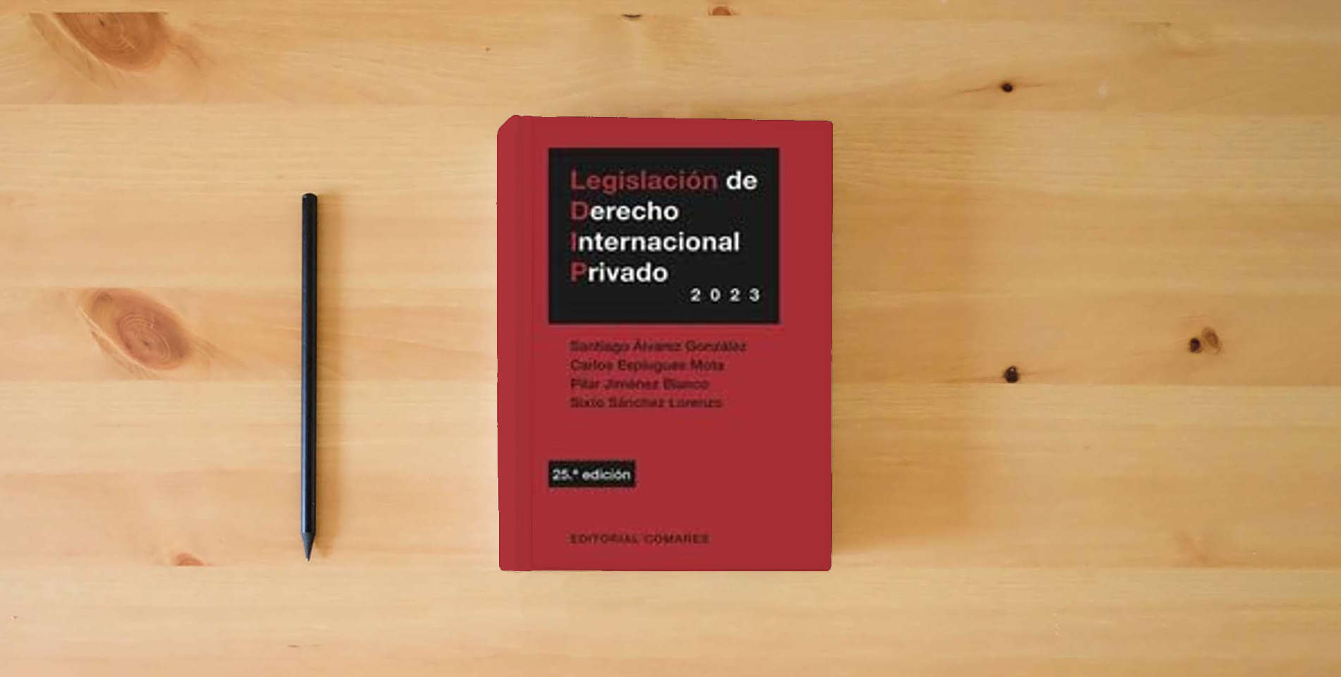 The book Legislación de Derecho Internacional Privado is on the table