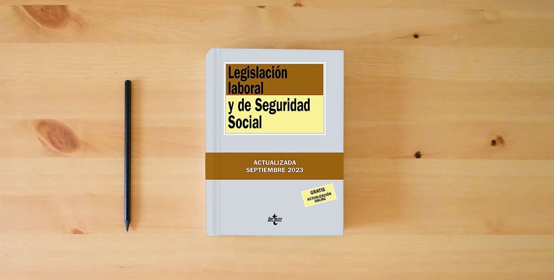 The book Legislación laboral y de Seguridad Social (Derecho - Biblioteca de Textos Legales) is on the table