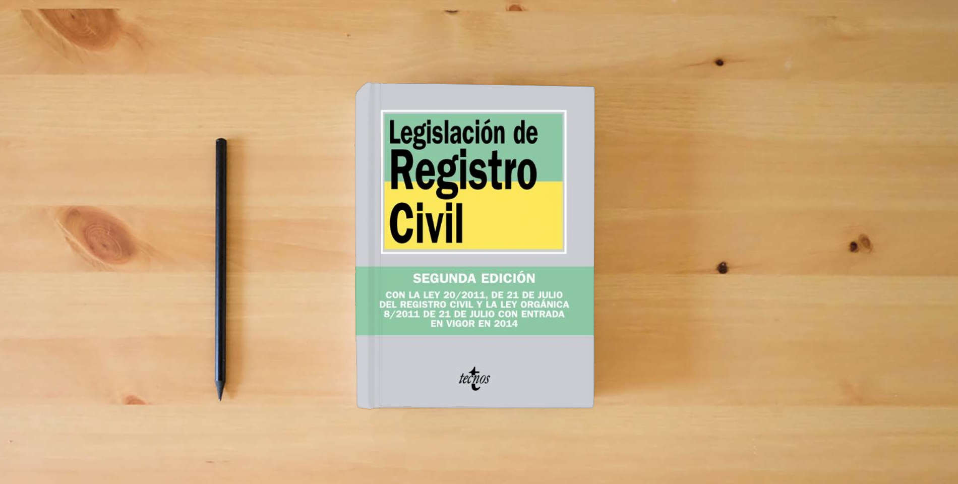 The book Legislación de Registro Civil (Derecho - Biblioteca de Textos Legales) is on the table