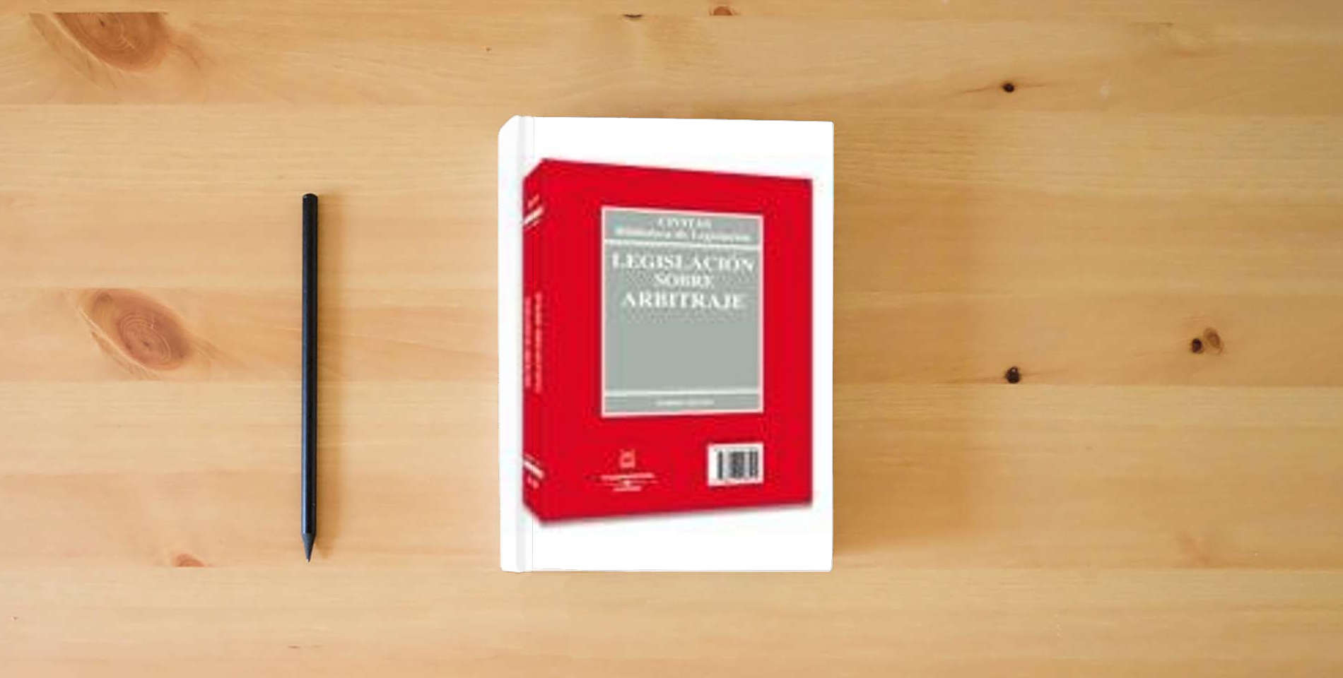 The book Legislación sobre Arbitraje/Legislation on Arbitration: 57 (Biblioteca de Legislación) is on the table