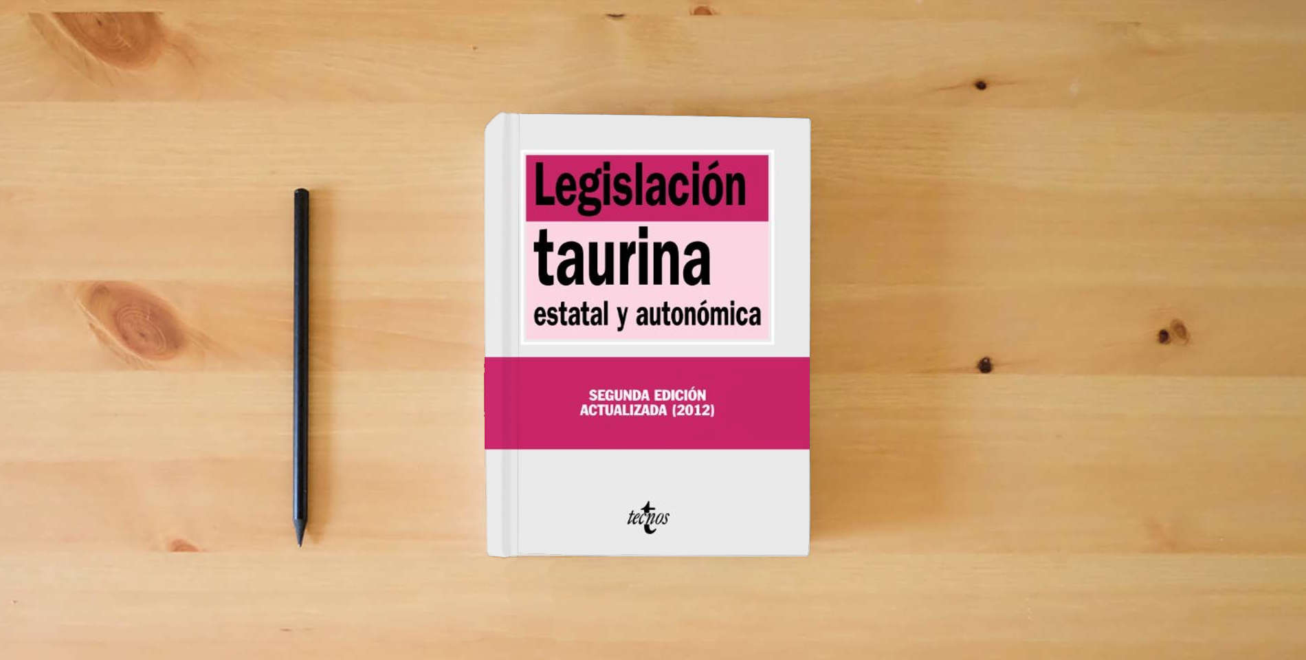 The book Legislación taurina: estatal y autonómica (Derecho - Biblioteca de Textos Legales) is on the table