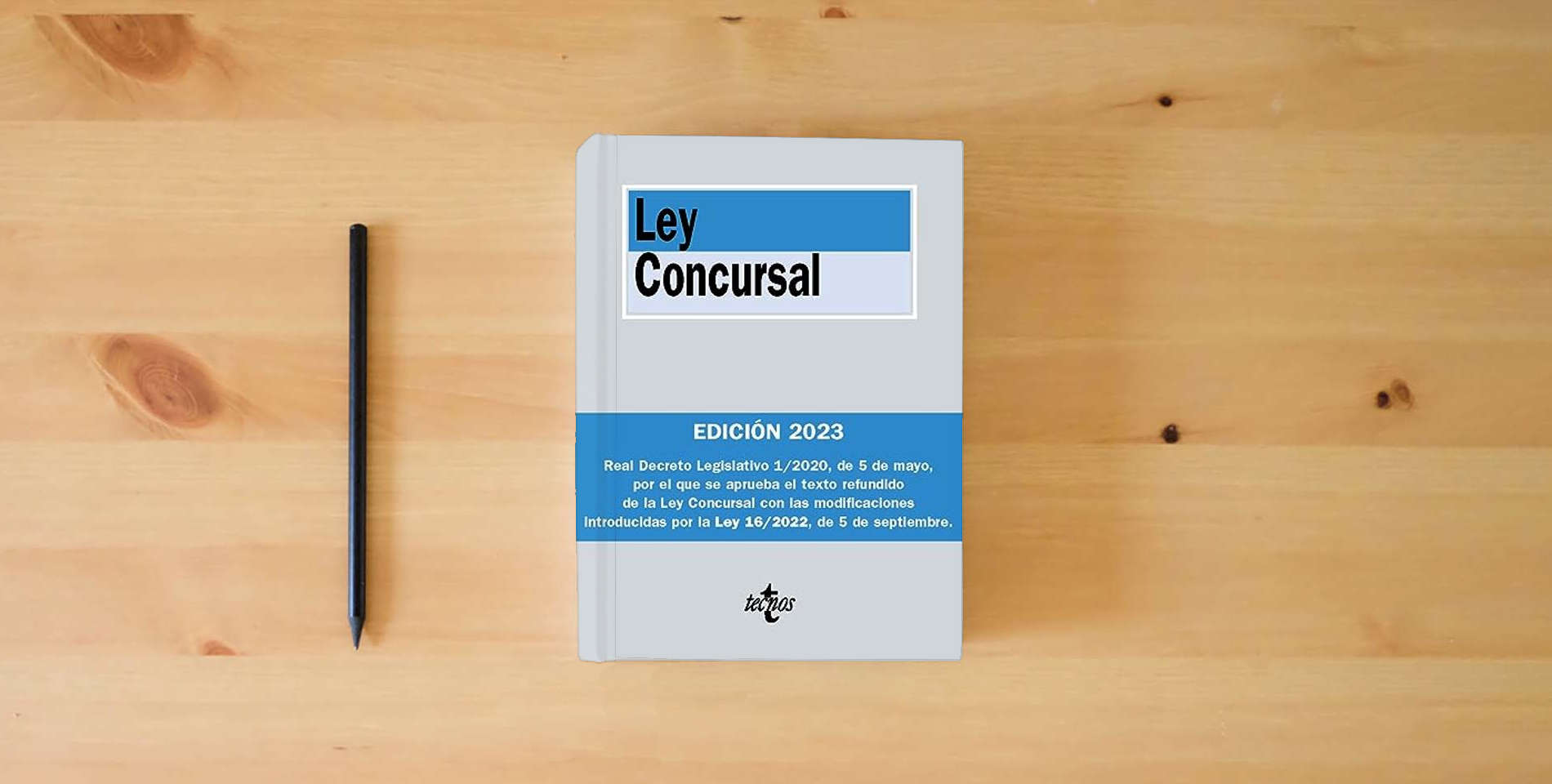 The book Ley Concursal (Derecho - Biblioteca de Textos Legales) is on the table