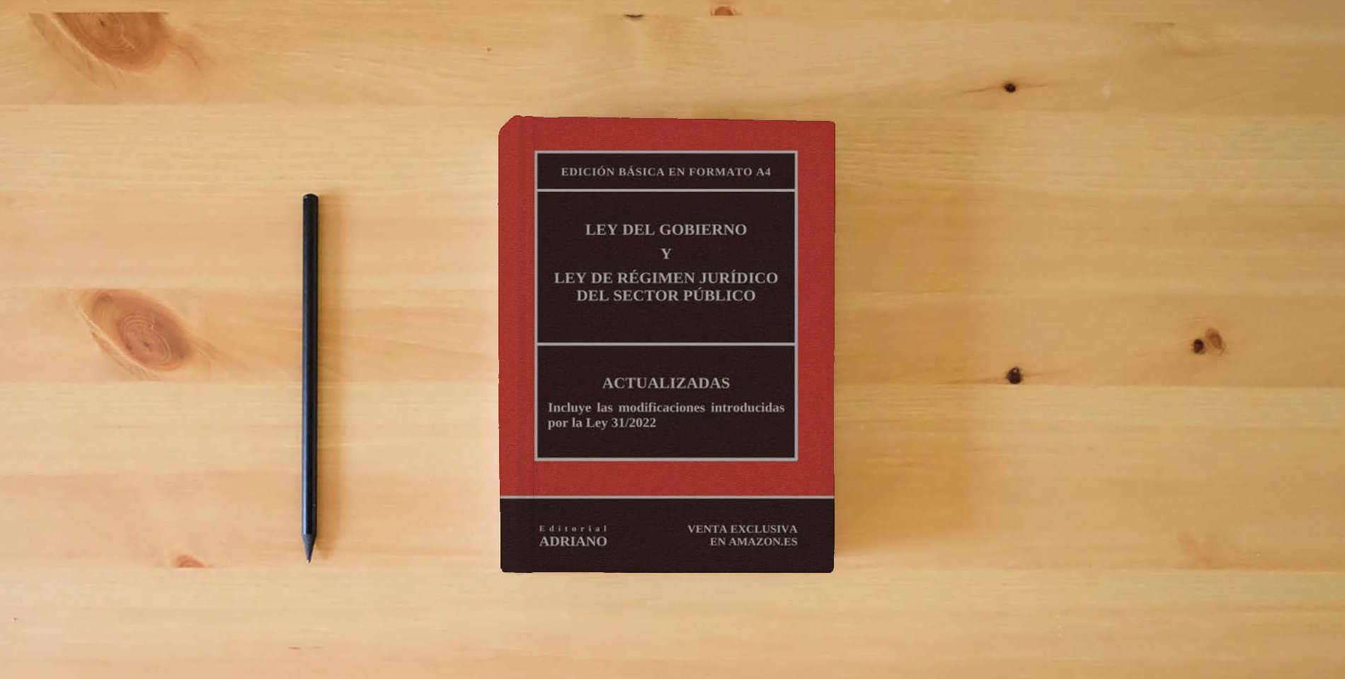 The book Ley del Gobierno y Ley de Régimen Jurídico del Sector Público: Edición básica en formato A4 is on the table